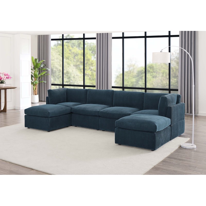 annai 129" wide reversible modular corner sectional with ottoman (left arm chair only)