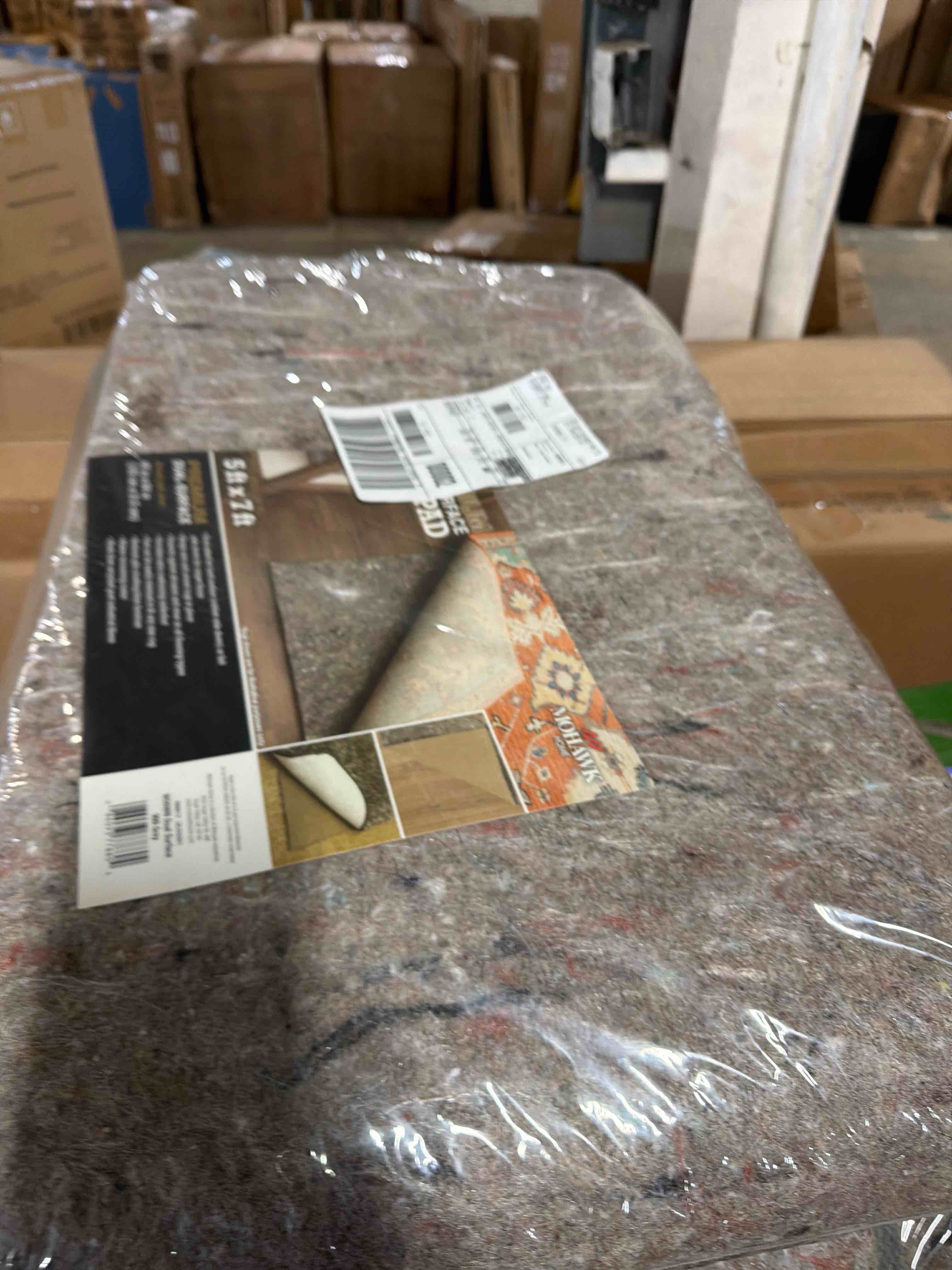 Condition photo showing New/Like New for mohawk home non slip rug pad 8' x 10' - 1/4" thick felt + latex rubber gripper - dual surface cushion for hardwood, carpet, tile floors, made in usa