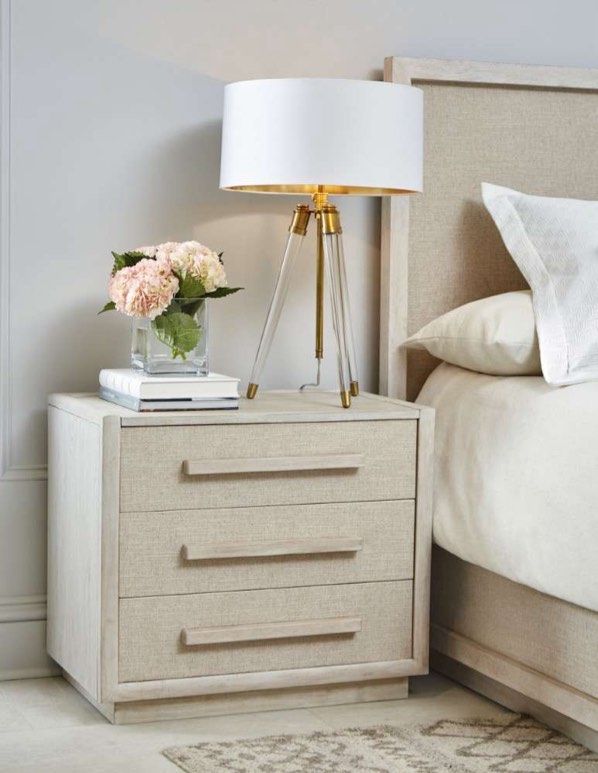 Condition photo showing New/Like New for a.r.t. cotiere beige oak wood 3 drawer nightstand with linen panels. 30w x 18d x 26h
