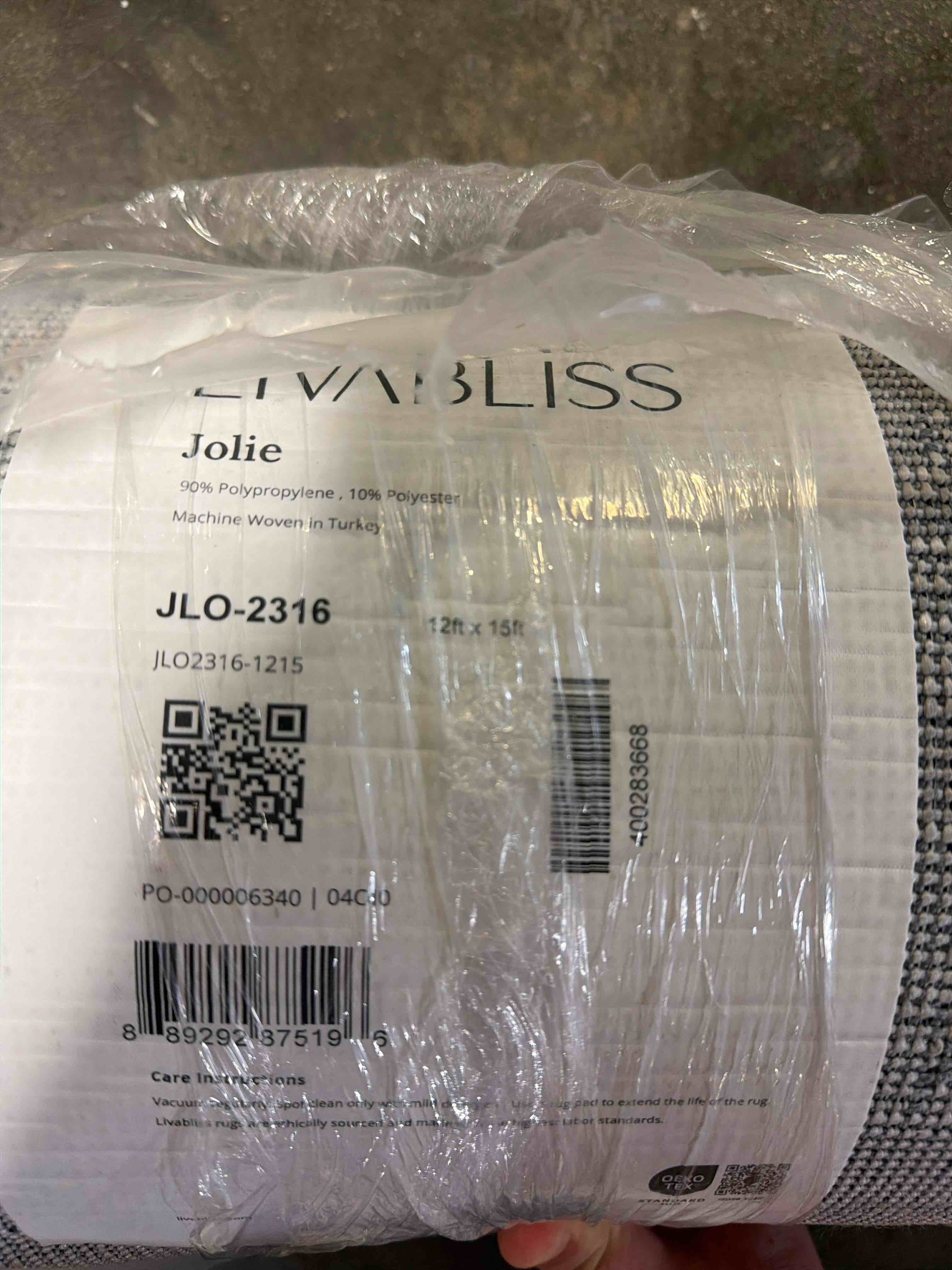 Condition photo showing New/Like New for livabliss jolie jlo 12 x 15 machine woven rug, made in turkey, polypropylene 90%; polyester 10%, spot clean only with mild detergent, colors- black;charcoal;dark blue;ivory;light gray;medium gray;slate;tan