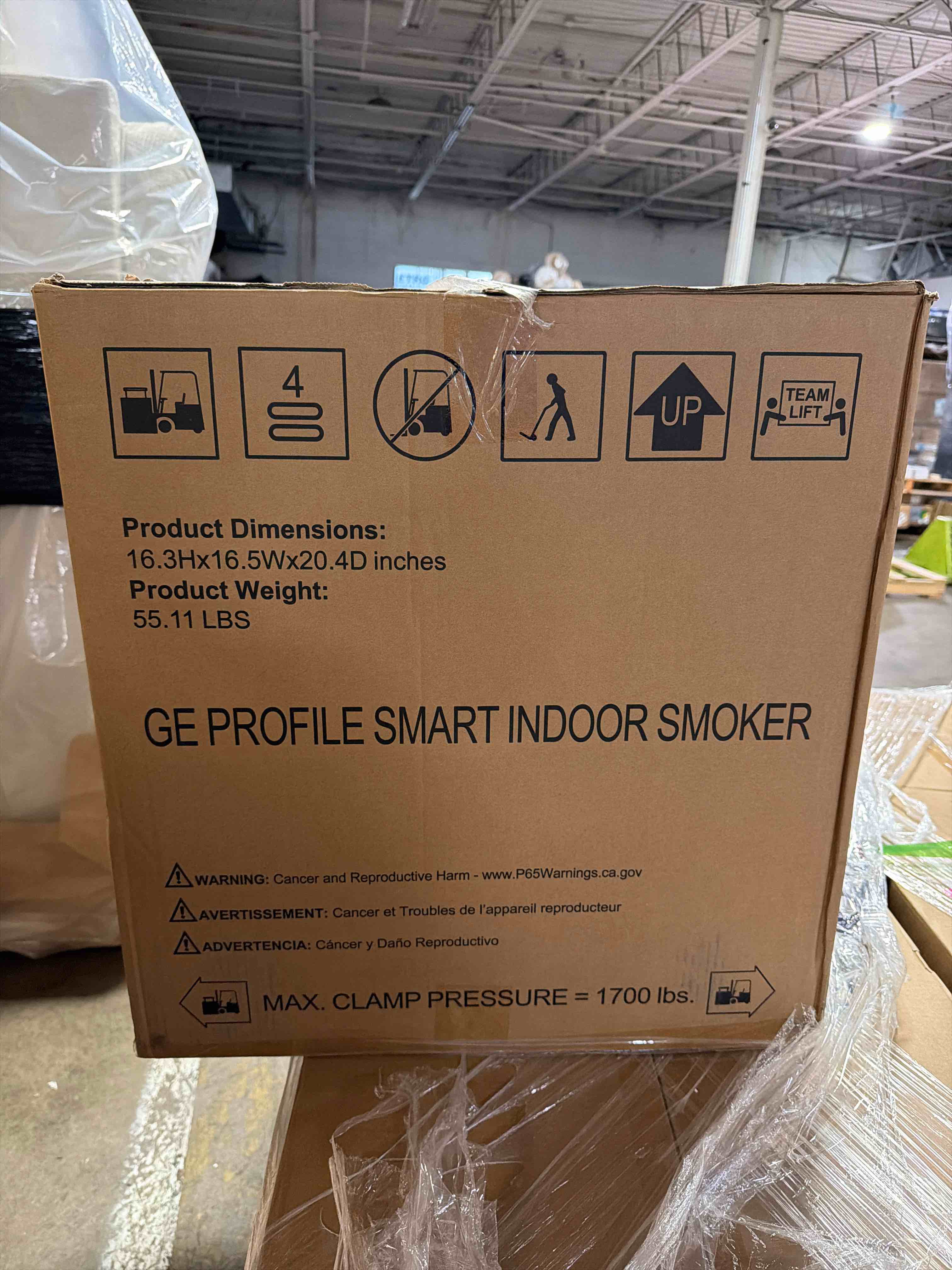 Condition photo showing New/Like New for ge profile black smart indoor pellet smoker, with active smoke filtration, 5 smoke control settings, wifi connected, electric, countertop bbq appliance, new in box