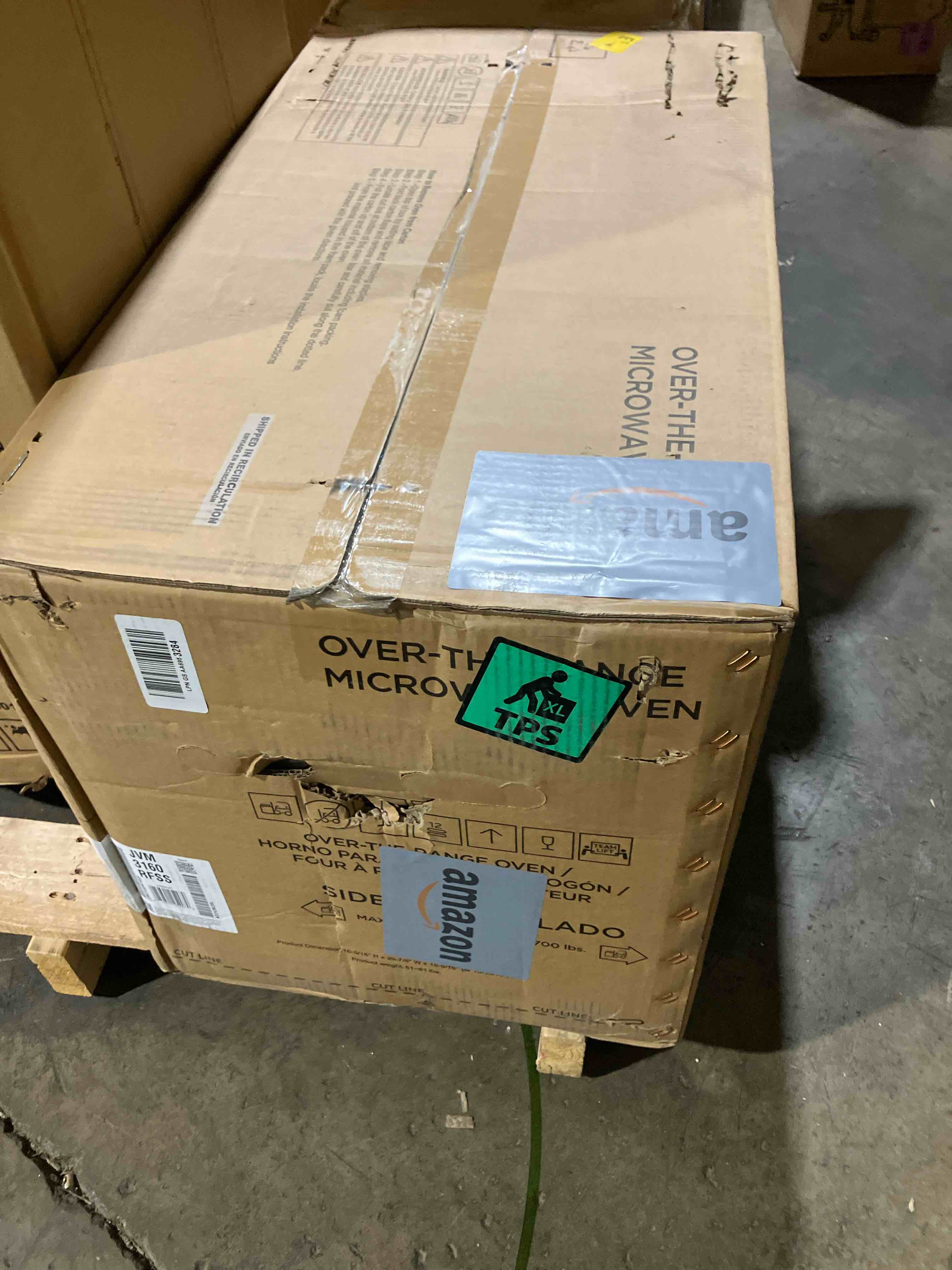 Condition photo showing New/Like New for ge 30" over-the-range microwave, 1.6 cu. ft., 1000 watts, 300 cfm hood vent, led lighting, auto defrost, easy mount install, stainless steel, jvm3160rfss