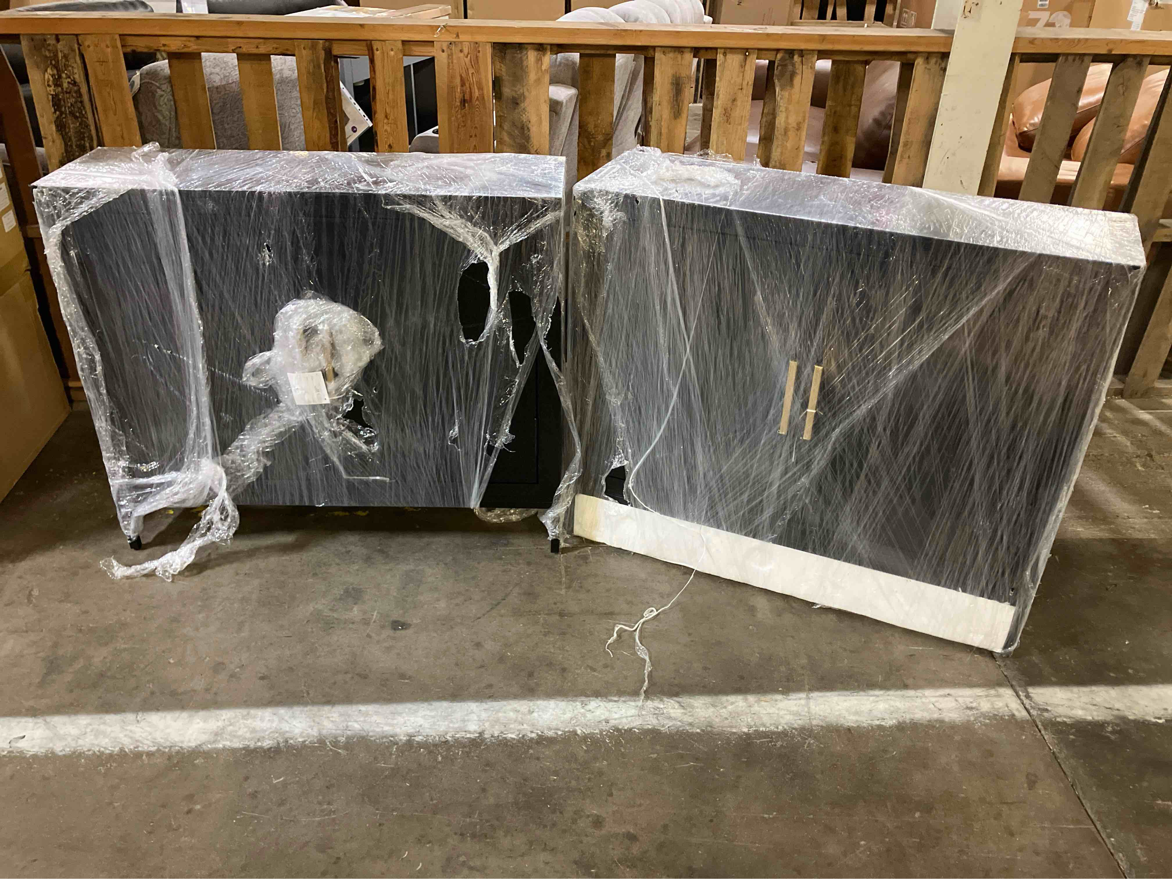 Condition photo showing New/Like New for set of 2 uttermost front range - 2 door cabinet-32.5 inches tall and 40.25 inches wide