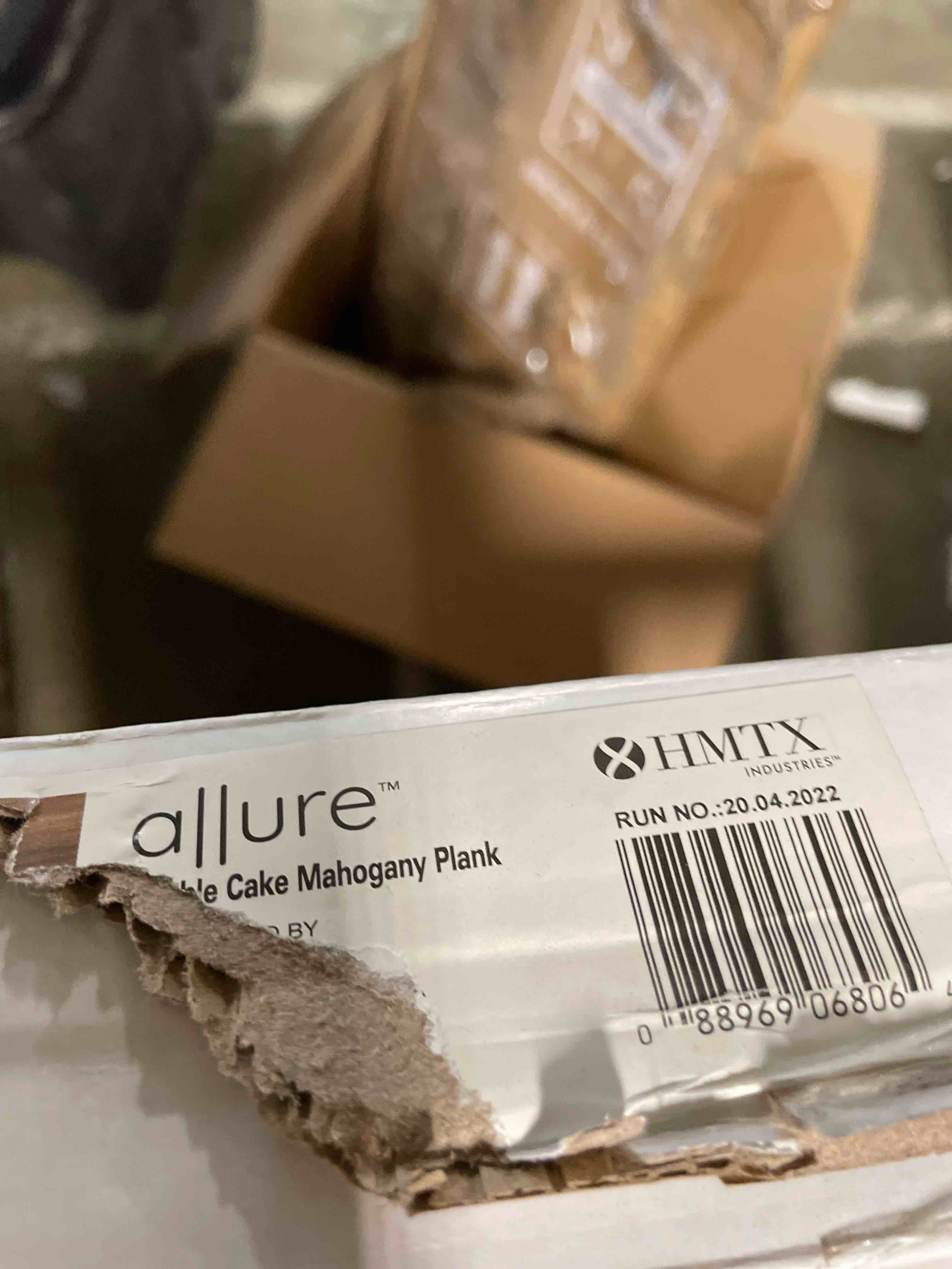 Condition photo showing New/Like New for allure 9" x 59" x 8mm, 12mil luxury vinyl xl plank flooring, marble cake mahogany look, embossed, waterproof, 1 case, 6 planks/box, 21.45 sqft/box