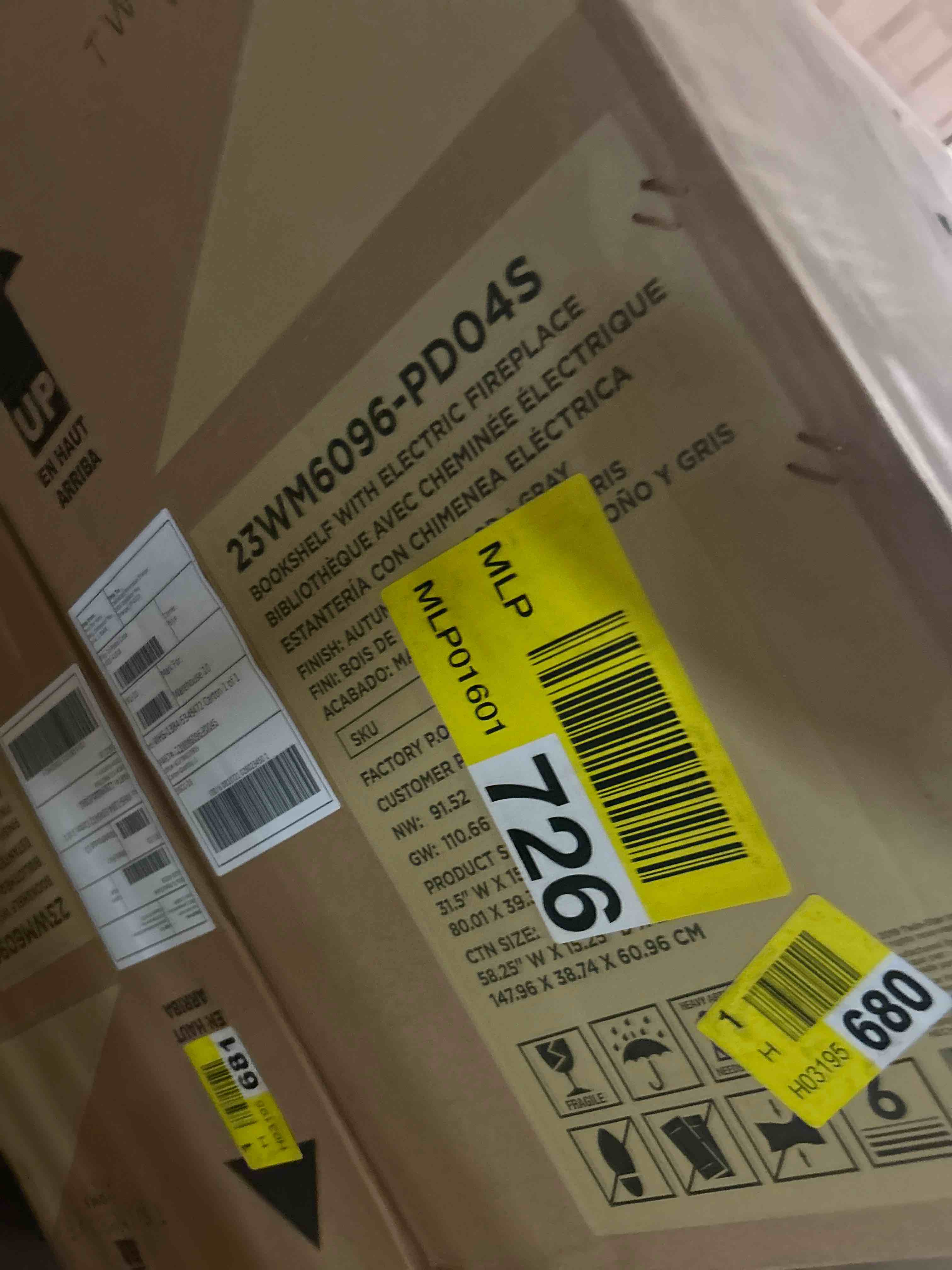 Condition photo showing New/Like New for industrial bookshelf with electric fireplace