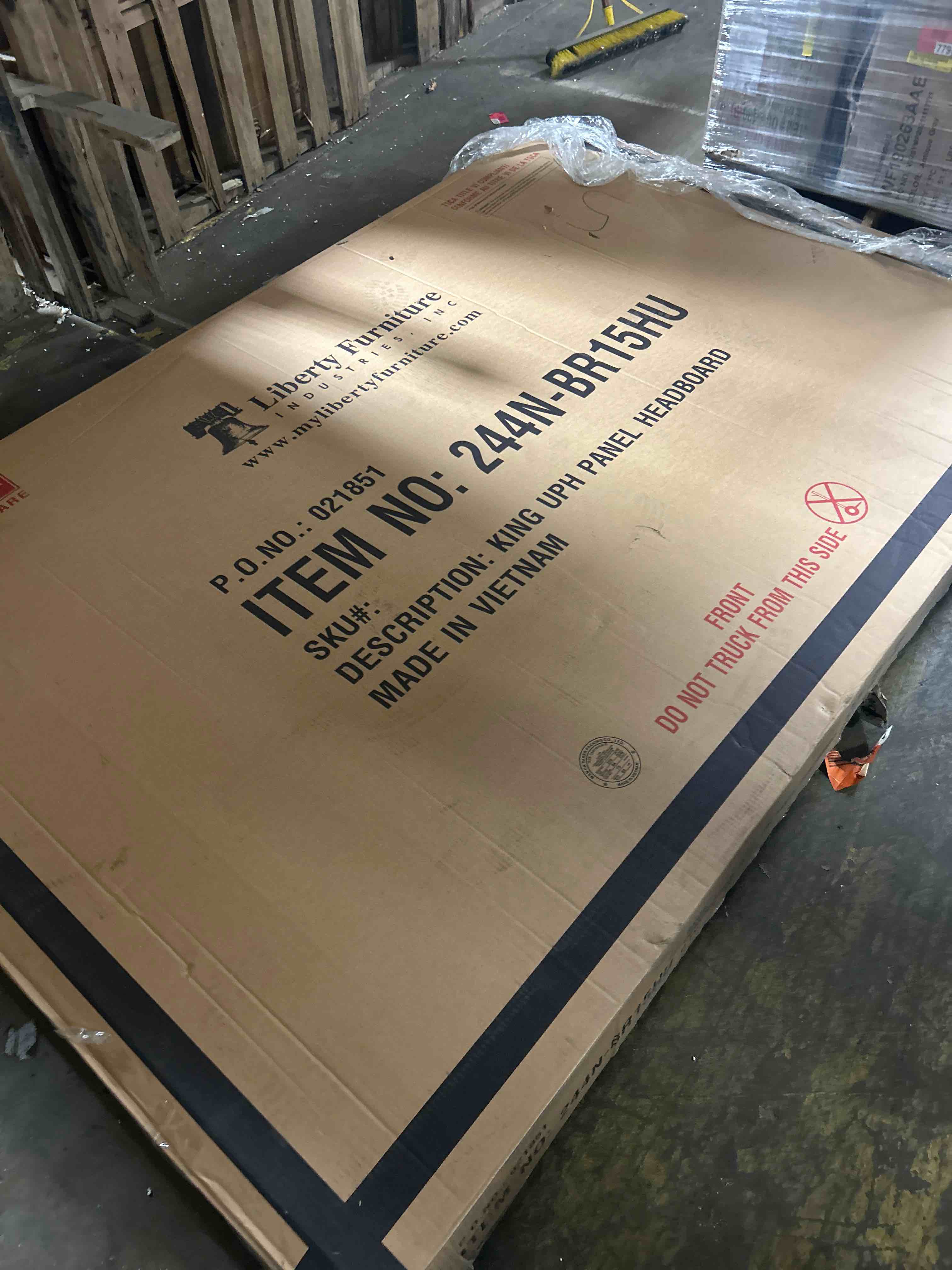 Condition photo showing As Is for liberty furniture magnolia manor ii king upholstered bed (headboard only)