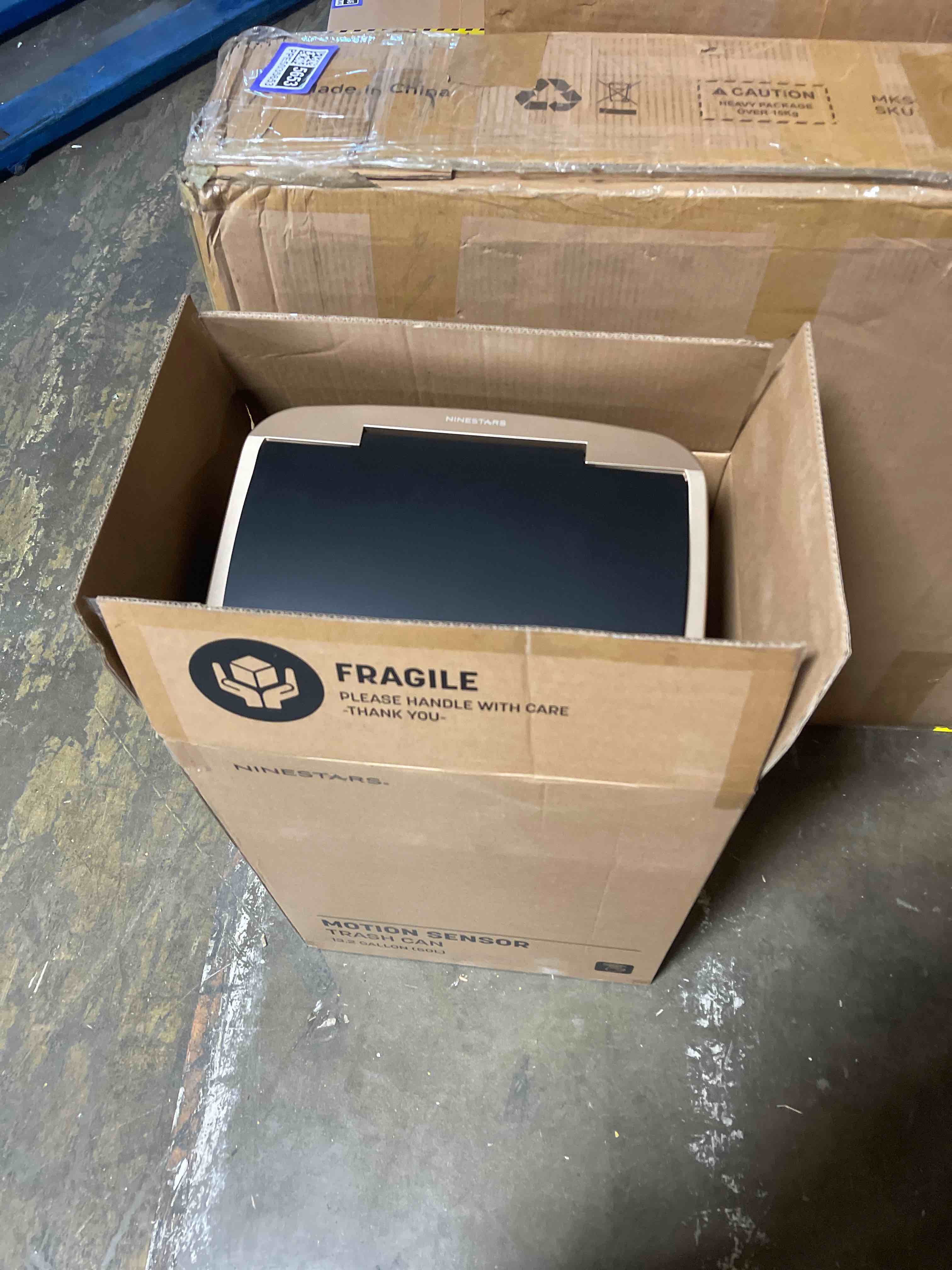 Condition photo showing New/Like New for 21 gal. auto-open infrared trash can