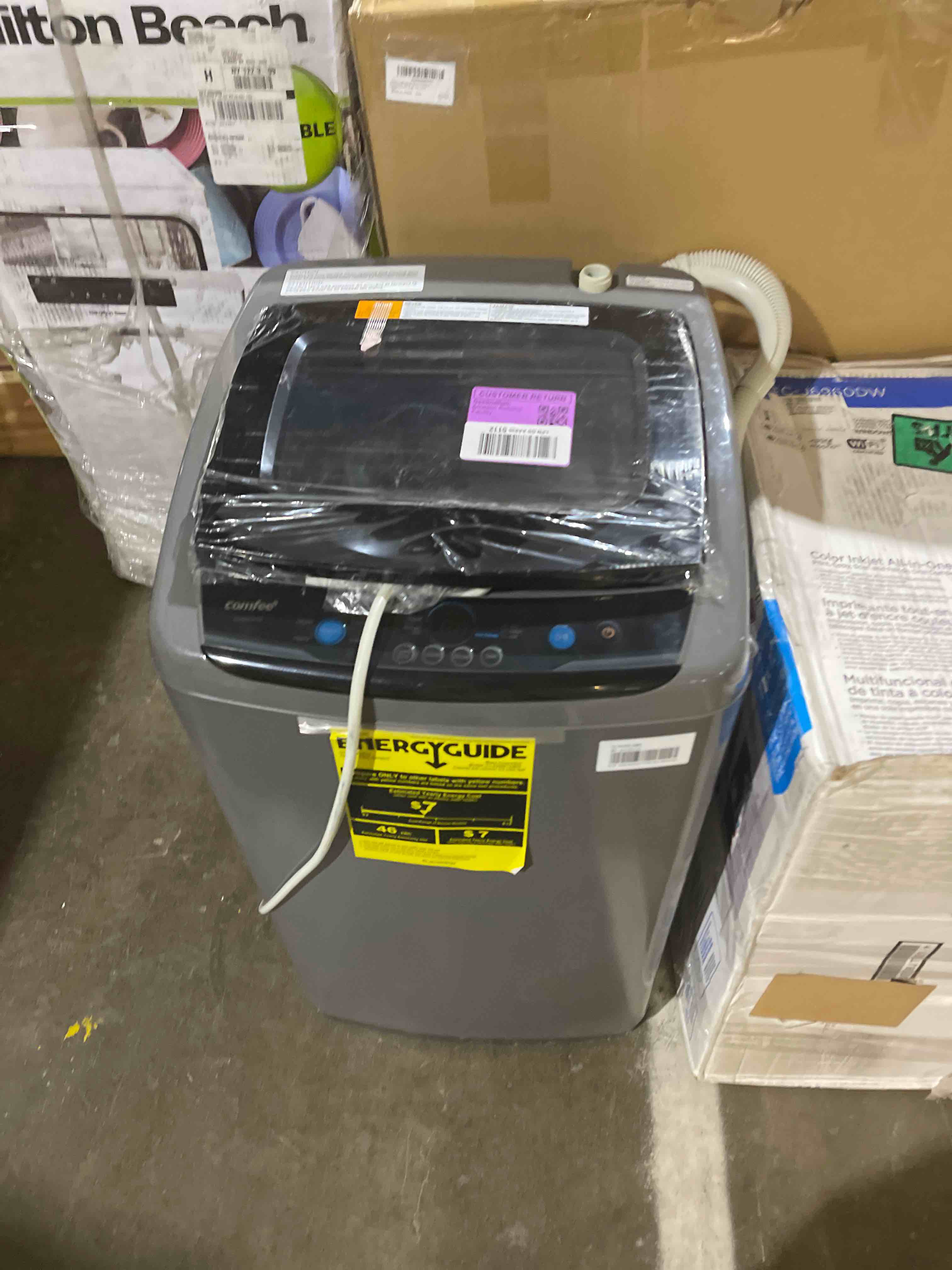 Condition photo showing As Is for comfee portable washing machine, 0.9 cu.ft compact washer with led display, 5 wash cycles, 2 built-in rollers, space saving full-automatic washer 0.9cu.ft gray