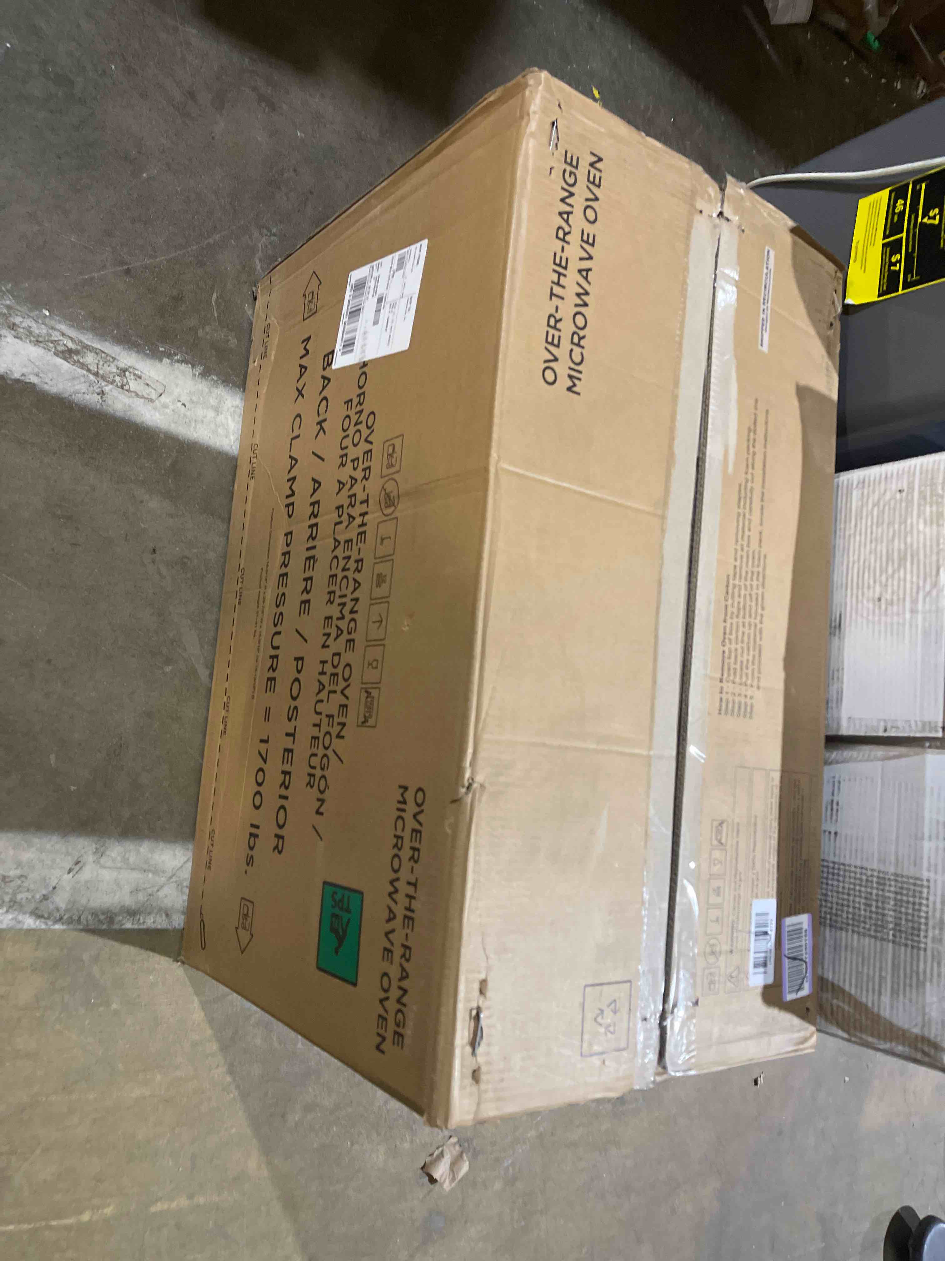 Condition photo showing New/Like New for whirlpool 1.7-cu ft over-the-range microwave ( fingerprint resistant stainless steel )