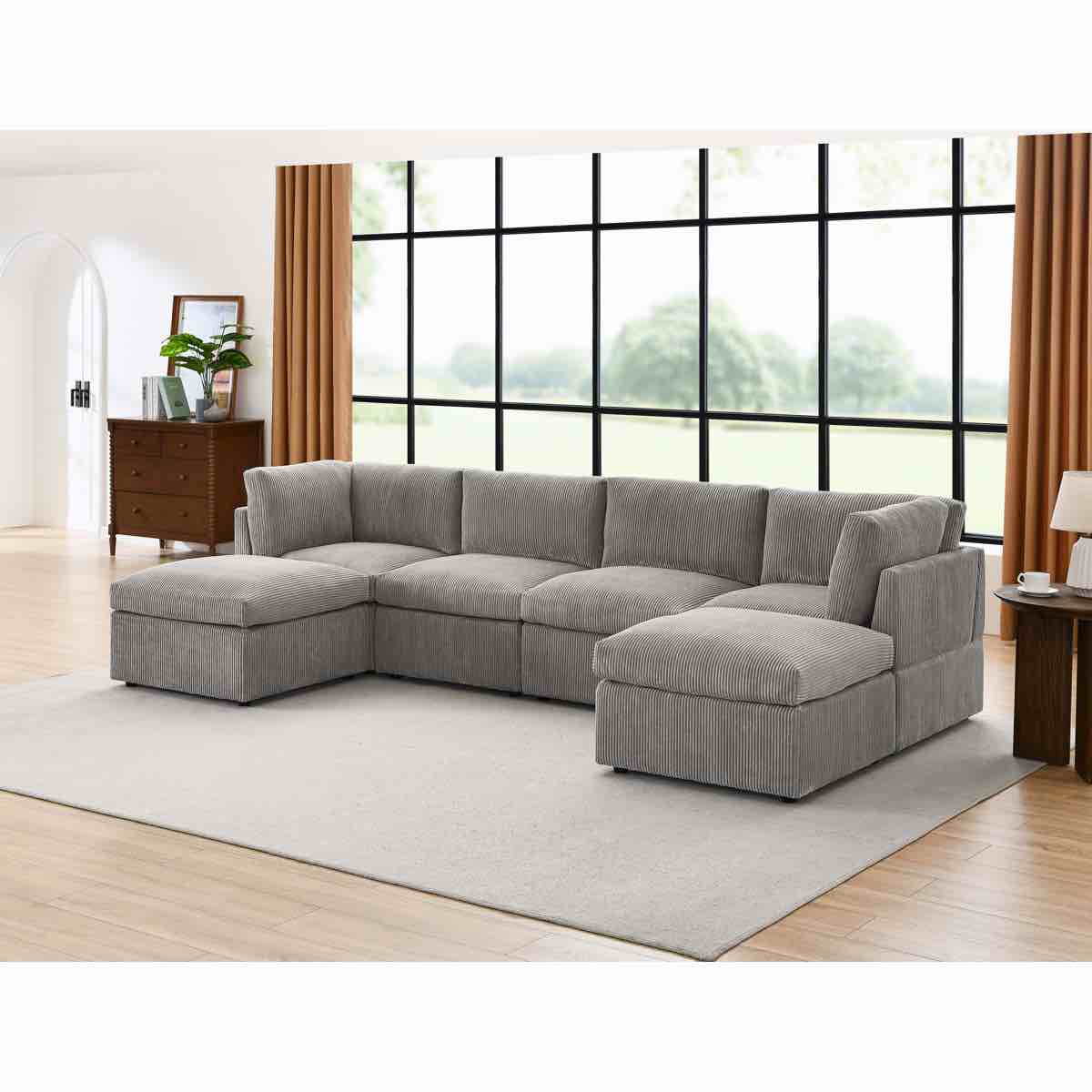 (INCLUDES: 2 ARMLESS CHAIRS/CORNER SEAT/ ottoman and 6 pillows)Annai 129" Wide Reversible Modular Corner Sectional with Ottoman
