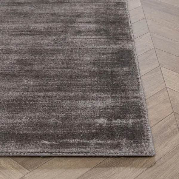 Condition photo showing New/Like New for cameron handwoven distressed viscose area rug in charcoal - 9x12 -(108 w x 144 l x 6 h)