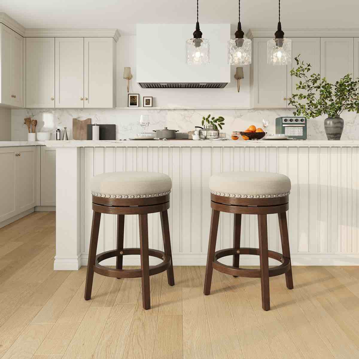 upholstered swivel counter bar stool with solid wood frame and nailhead trim (only one chair)