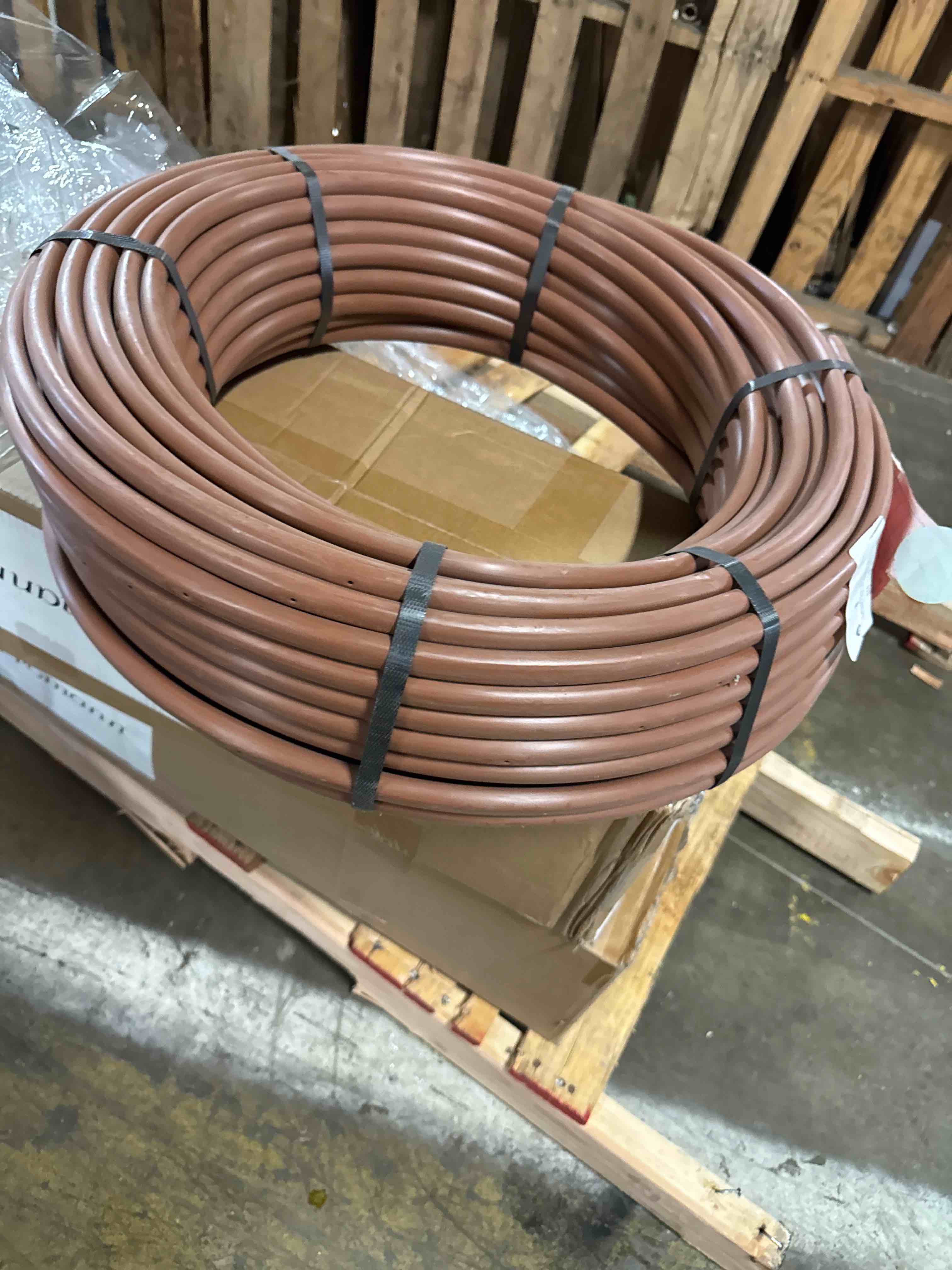 Condition photo showing New/Like New for rain bird xfd0912250 xf on surface dripline hose drip irrigation dual layered tubing coil with 0. gph and 12 inch spacing, 250 feet, brown