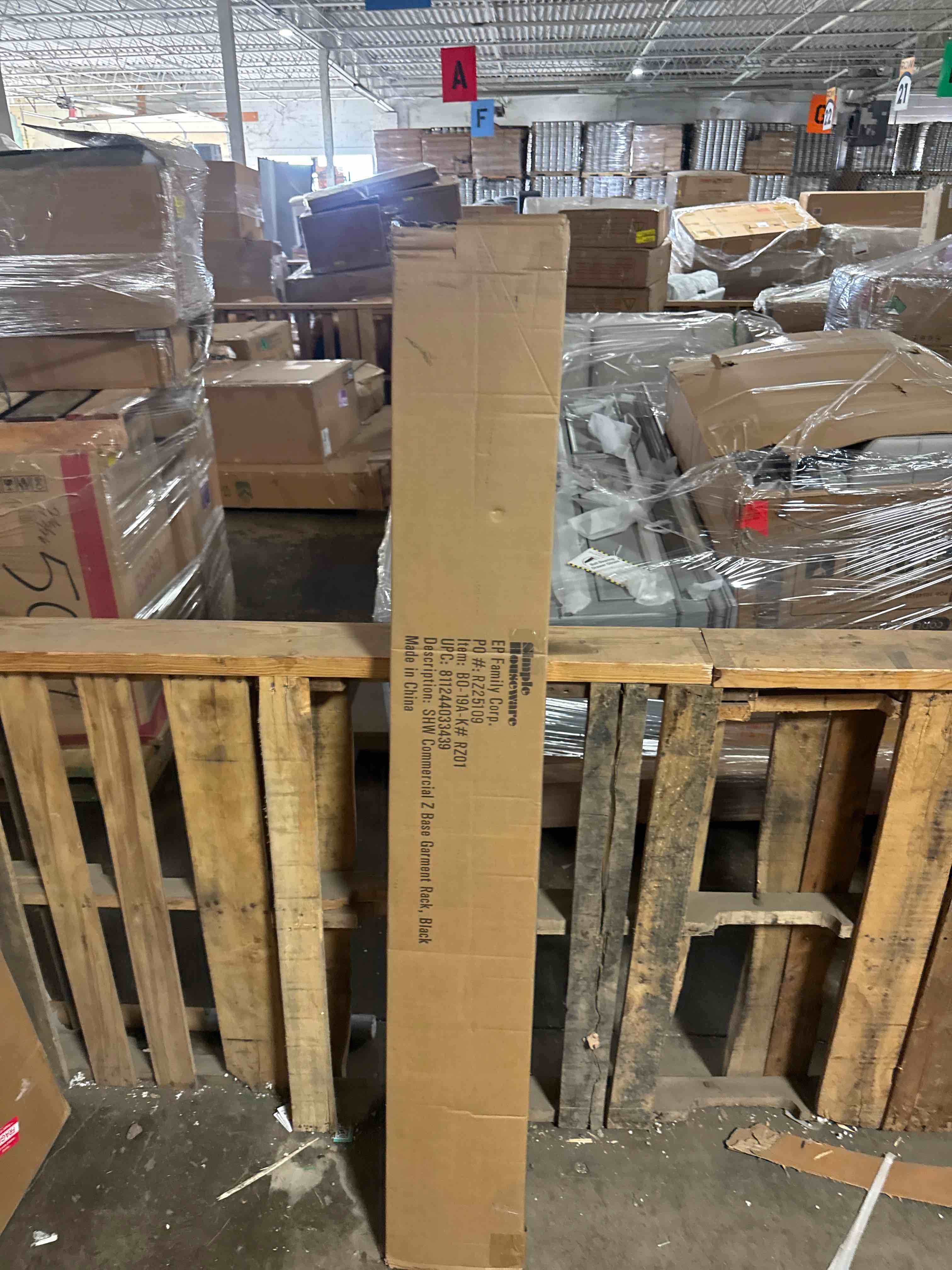 Condition photo showing New/Like New for simple houseware industrial grade z-base garment rack, 500lb load with 63 inches extra long bar, black