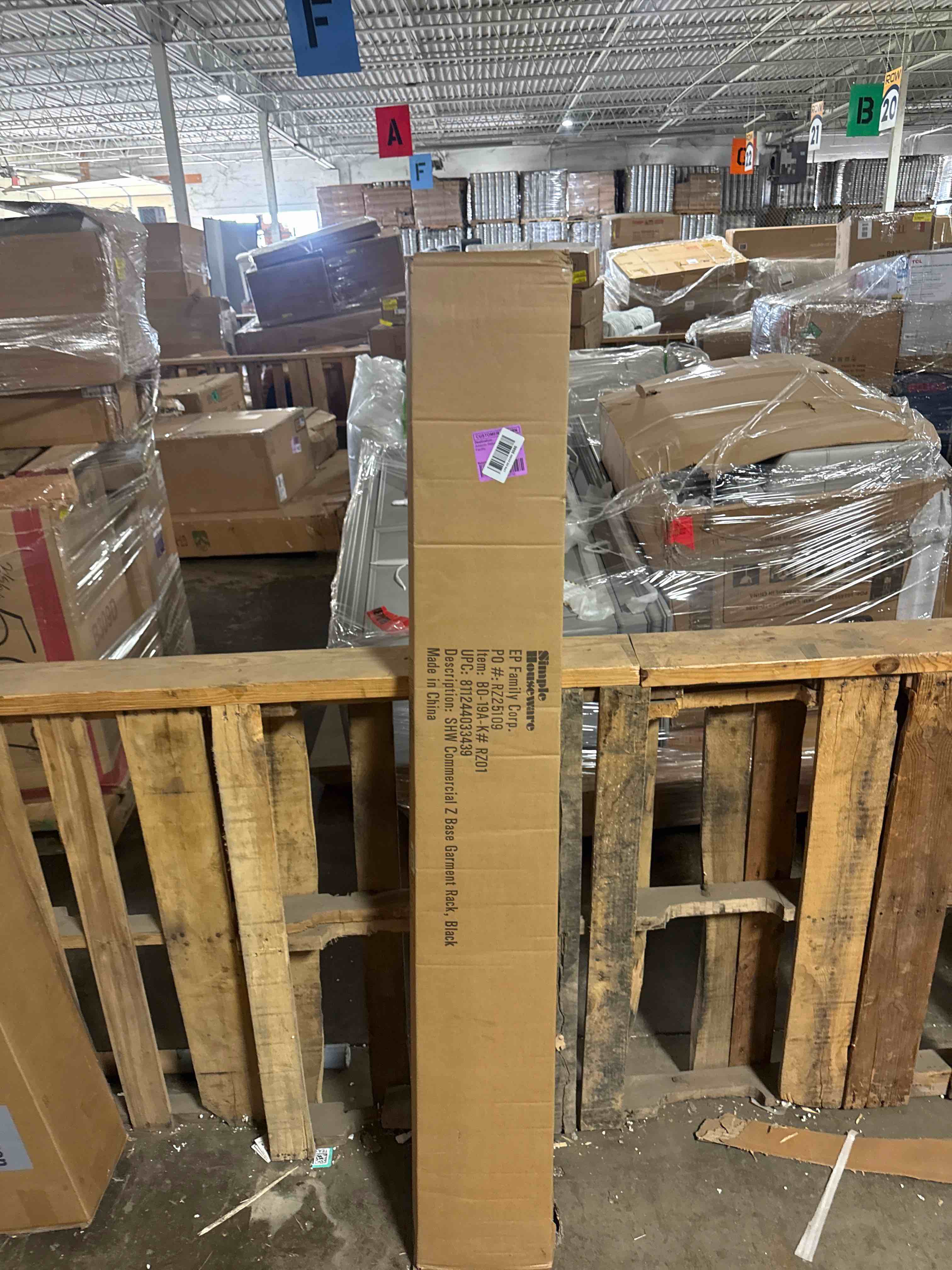 Condition photo showing New/Like New for simple houseware industrial grade z-base garment rack, 500lb load with 63 inches extra long bar, black