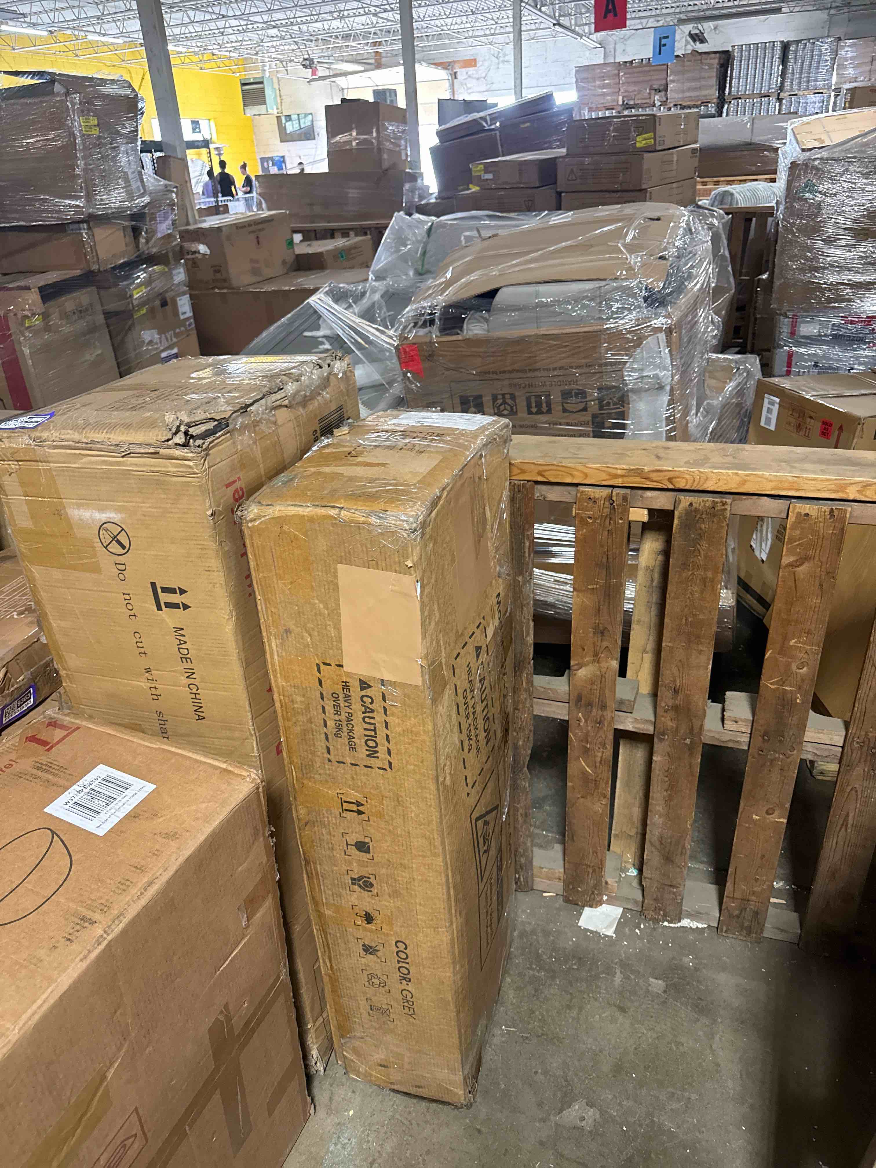 Condition photo showing New/Like New for fufu&gaga 42.3-in h 3 tier 12 pair grey composite shoe cabinet