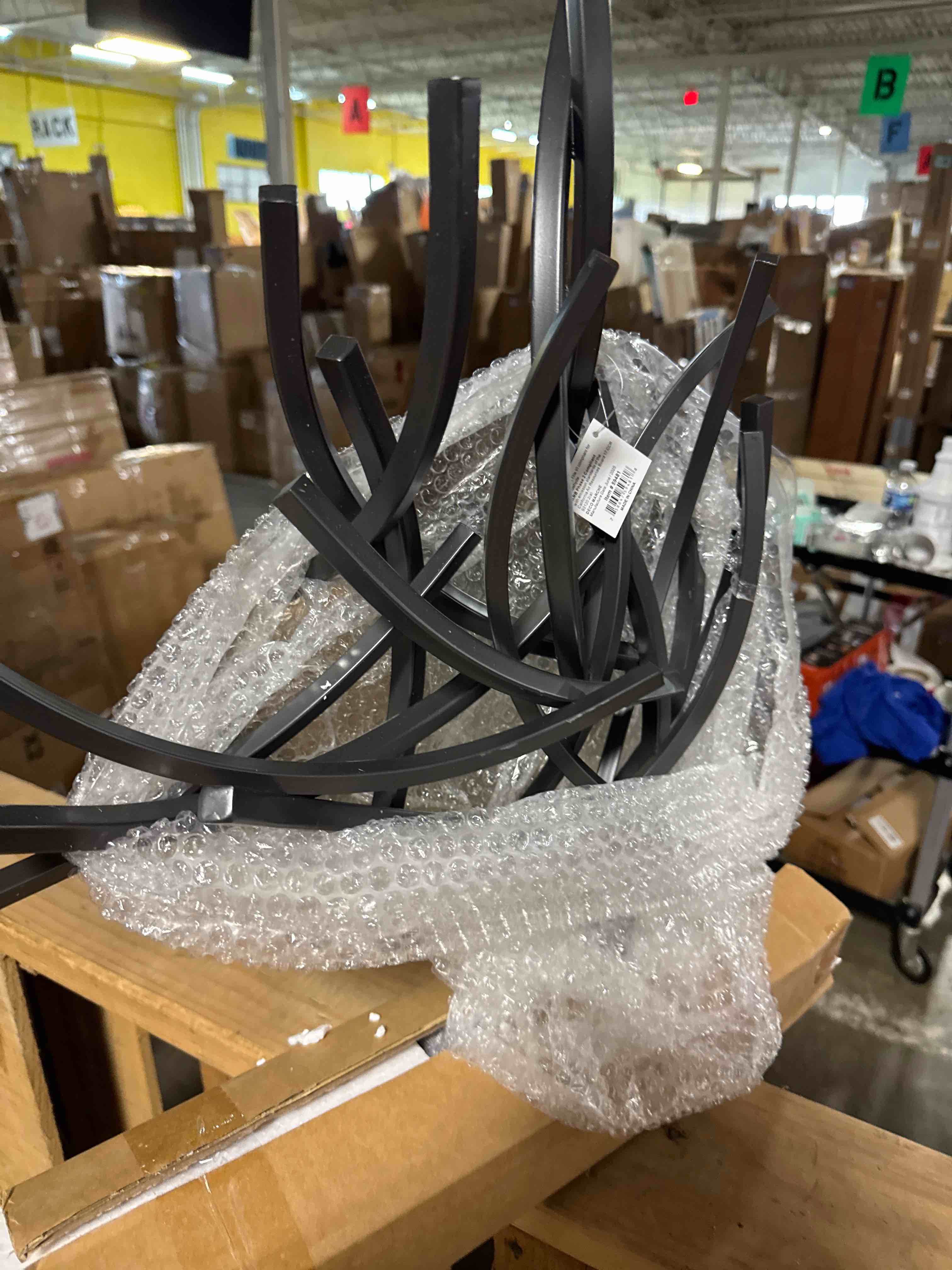 Condition photo showing New/Like New for deco 79 metal abstract sculpture with marble base, 17" x 7" x 24", gray