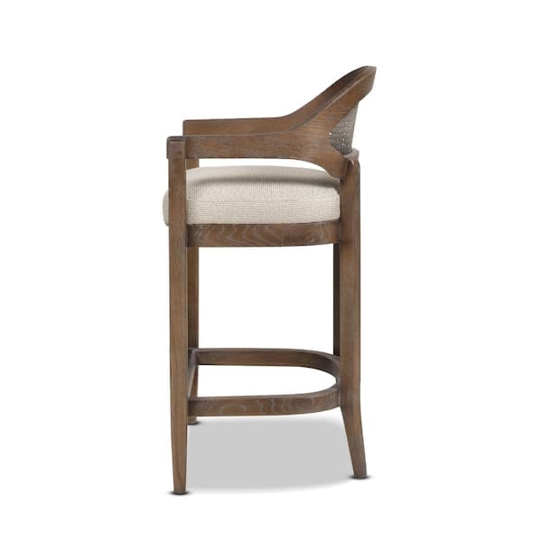 Condition photo showing New/Like New for americana 26in mid-century modern oak wood frame cane rattan back kitchen counter height bar stool in a taupe beige textured weave, brass plated front foot rest, overall dimensions 36.5h x 21w x 19d, item is new in box
