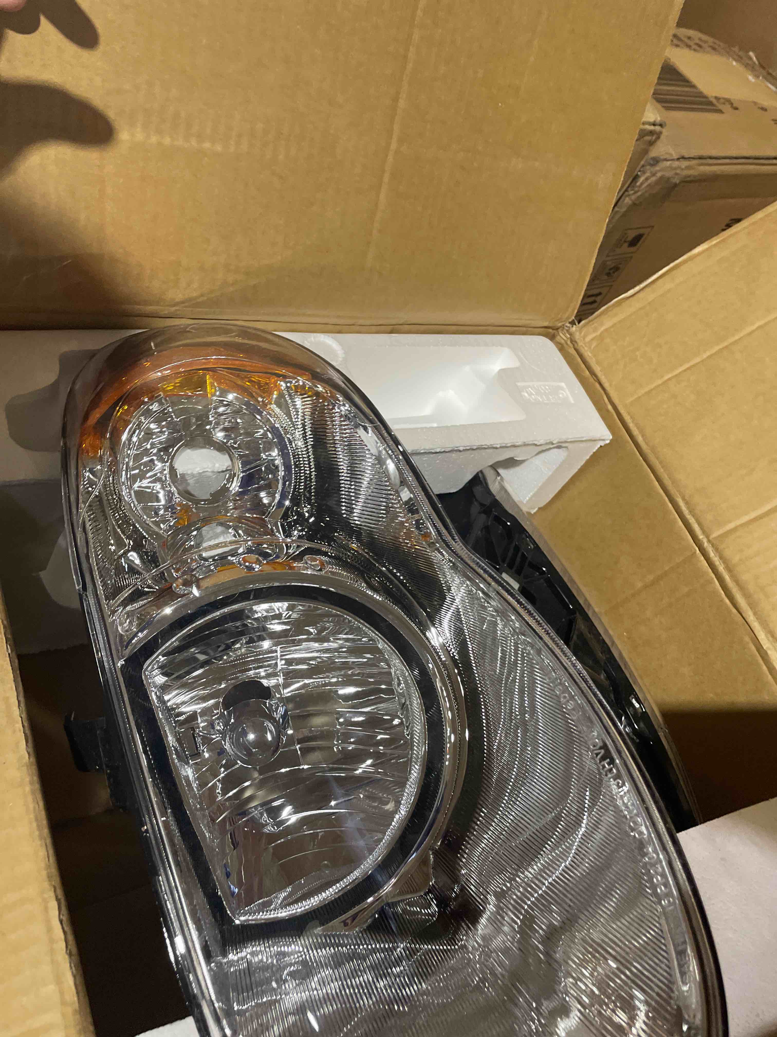 Condition photo showing New/Like New for headlightsdepot chrome housing halogen headlight compatible with chrysler town & country with 119in wheel base 2005-2007 includes right passenger side headlamp