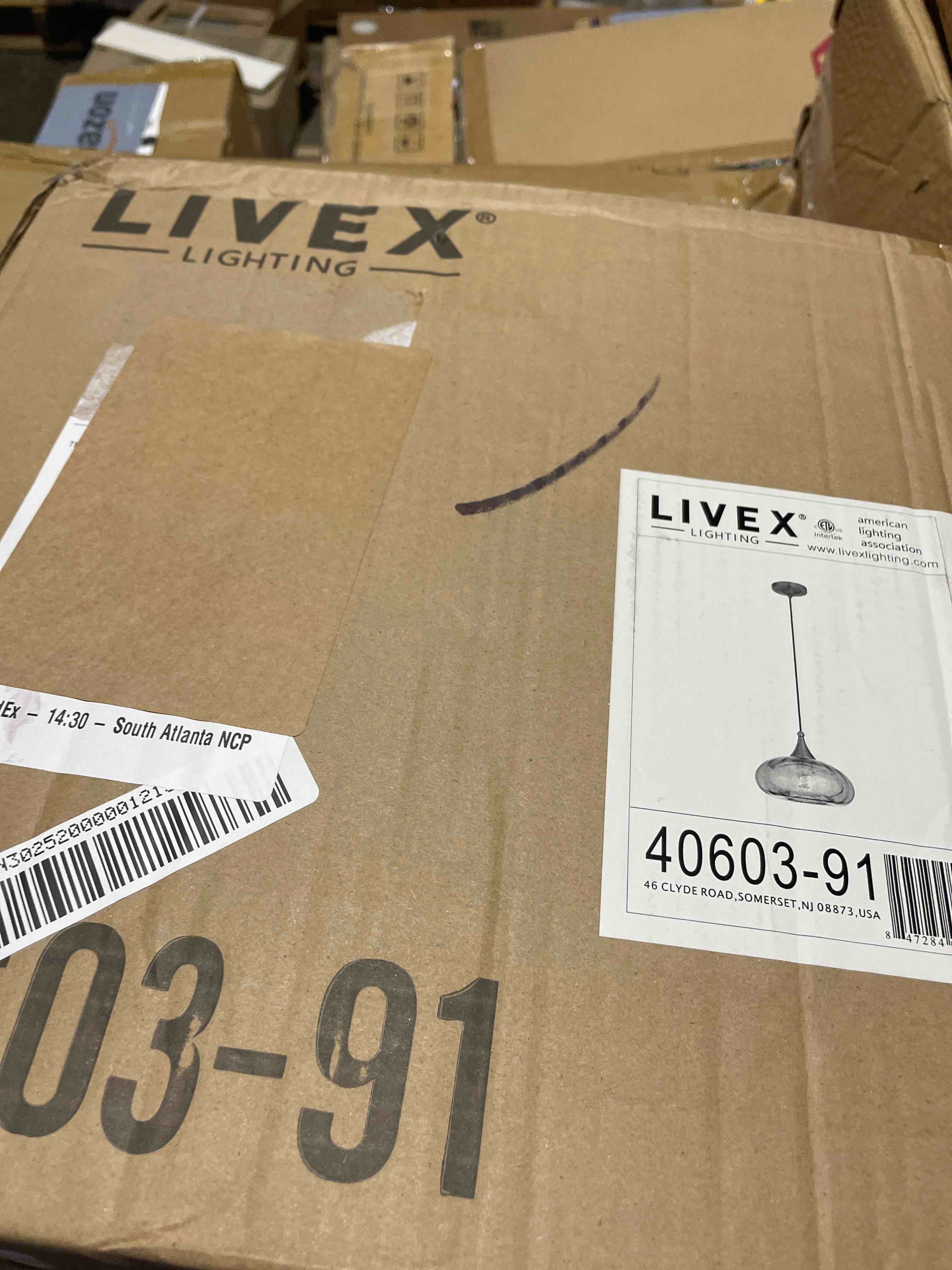 Condition photo showing New/Like New for livex art glass 40603 mini pendant light