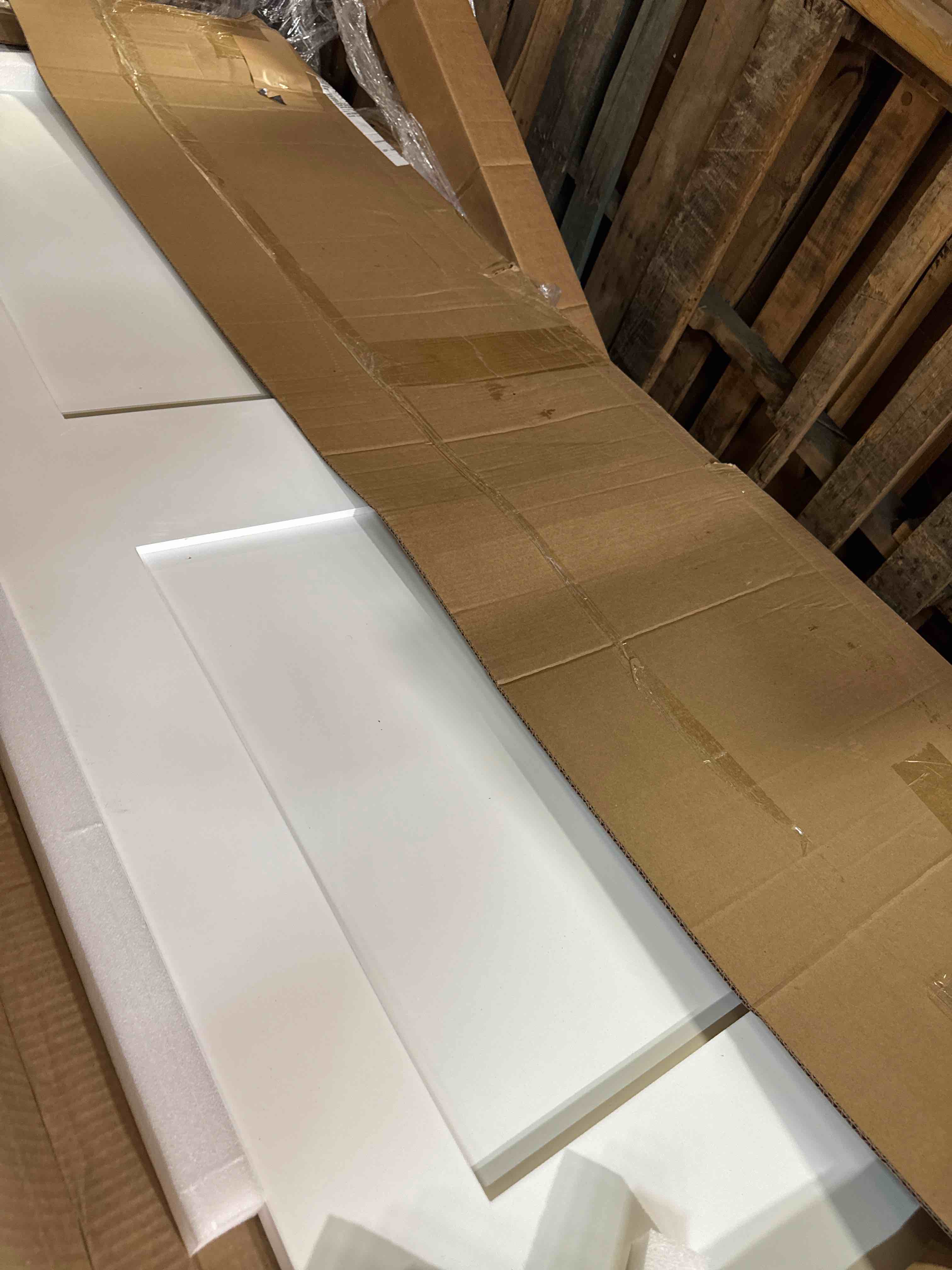 Condition photo showing New/Like New for snavely international 2-panel door, white primed shaker, solid wood core
