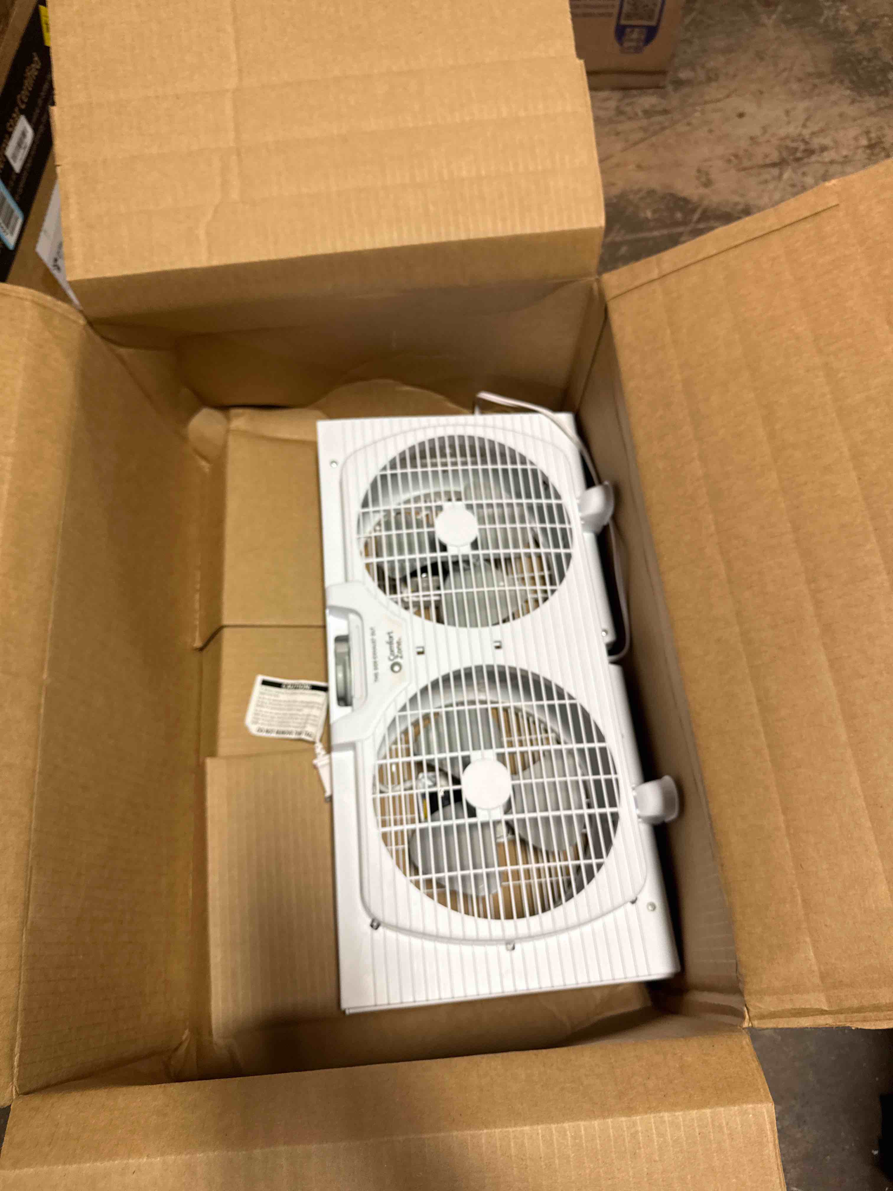 Condition photo showing Good Condition for comfort zone twin window fan with reversible airflow control, 9 inch, auto-locking expanders, 2 speed fan, dual fan, exhaust, airflow 9.84 ft/sec, ideal for home, kitchen, bedroom & office, cz319wt white 9"