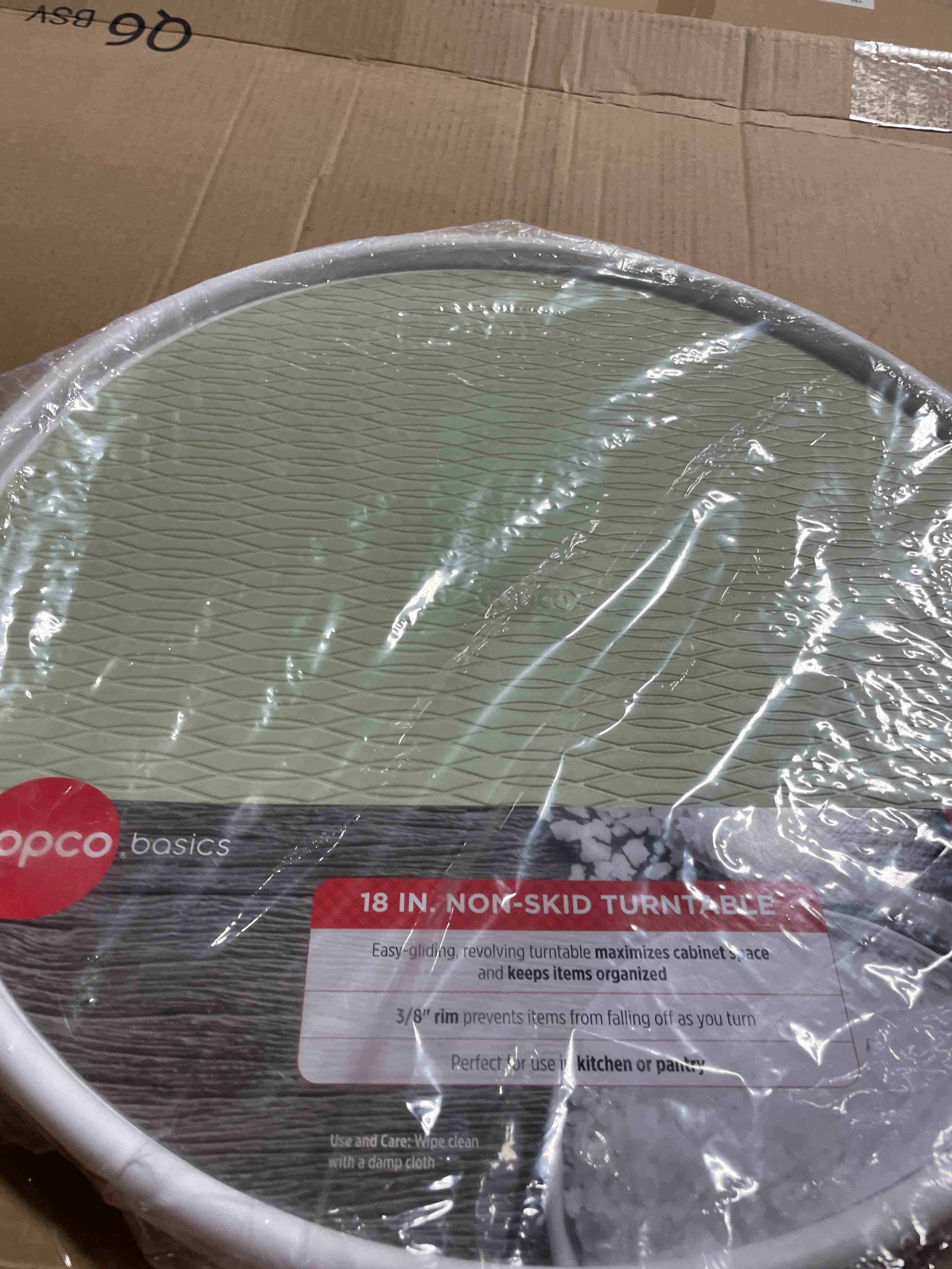 Condition photo showing New/Like New for copco basics non-skid lazy susan for under sink and cabinet storage, 18 inch, crystalline