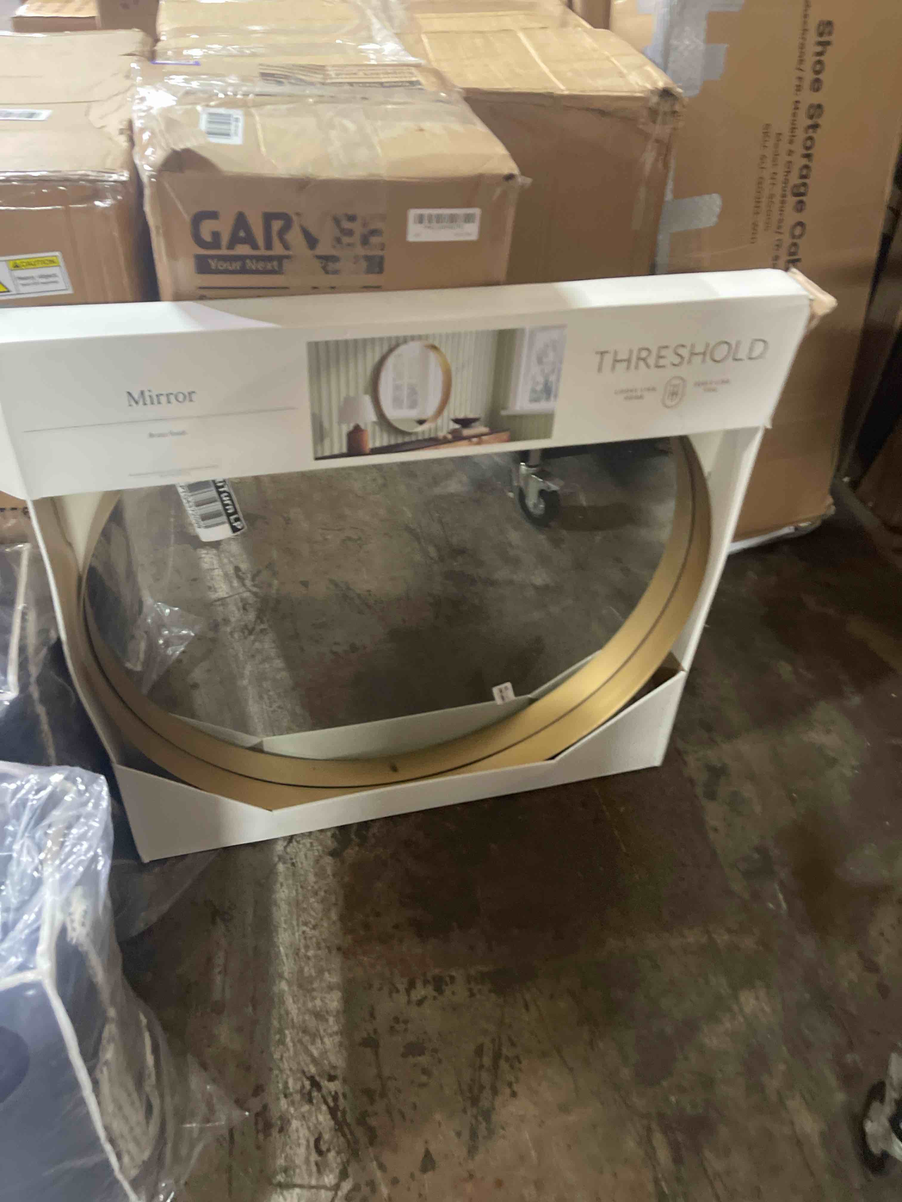 Condition photo showing New/Like New for threshold round brass mirror