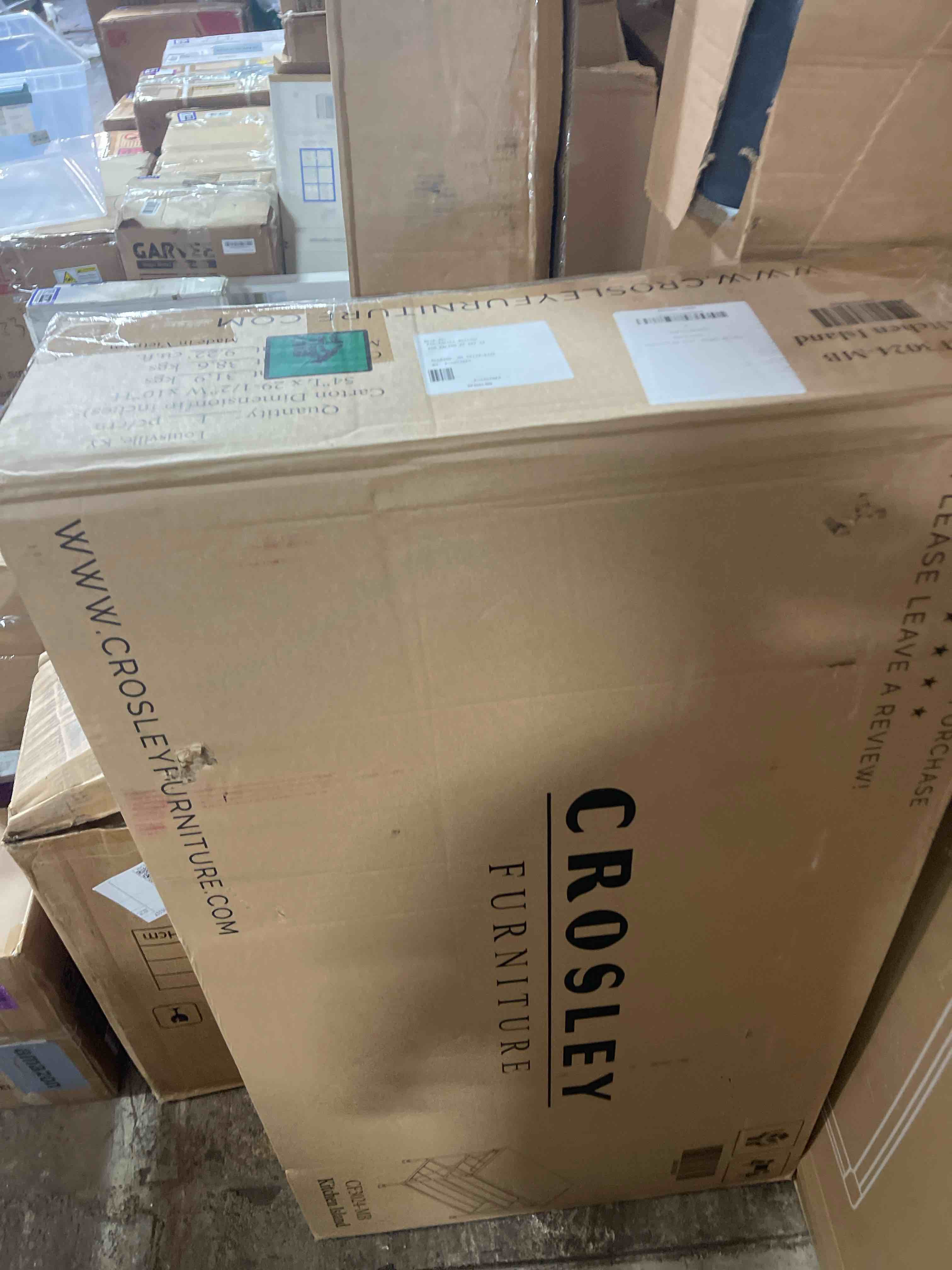 Condition photo showing New/Like New for crosley furniture madeleine kitchen island with shelves for storage, microwave stand, coffee bar, steel with faux marble top