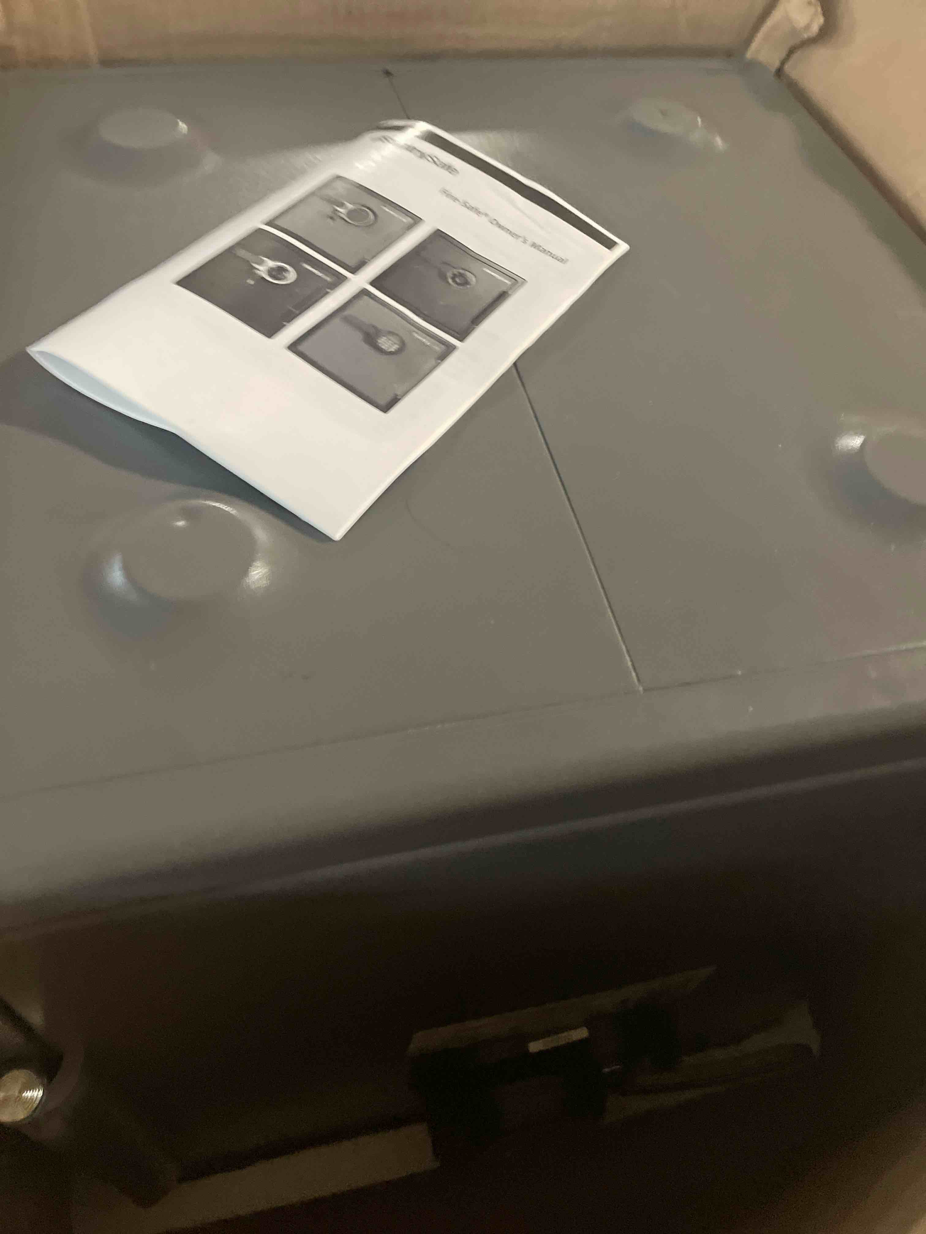 Condition photo showing As Is for sentrysafe black fireproof safe with digital push button keypad, home safe for money, documents, and other valuables, 1.23 cubic feet, sf123es