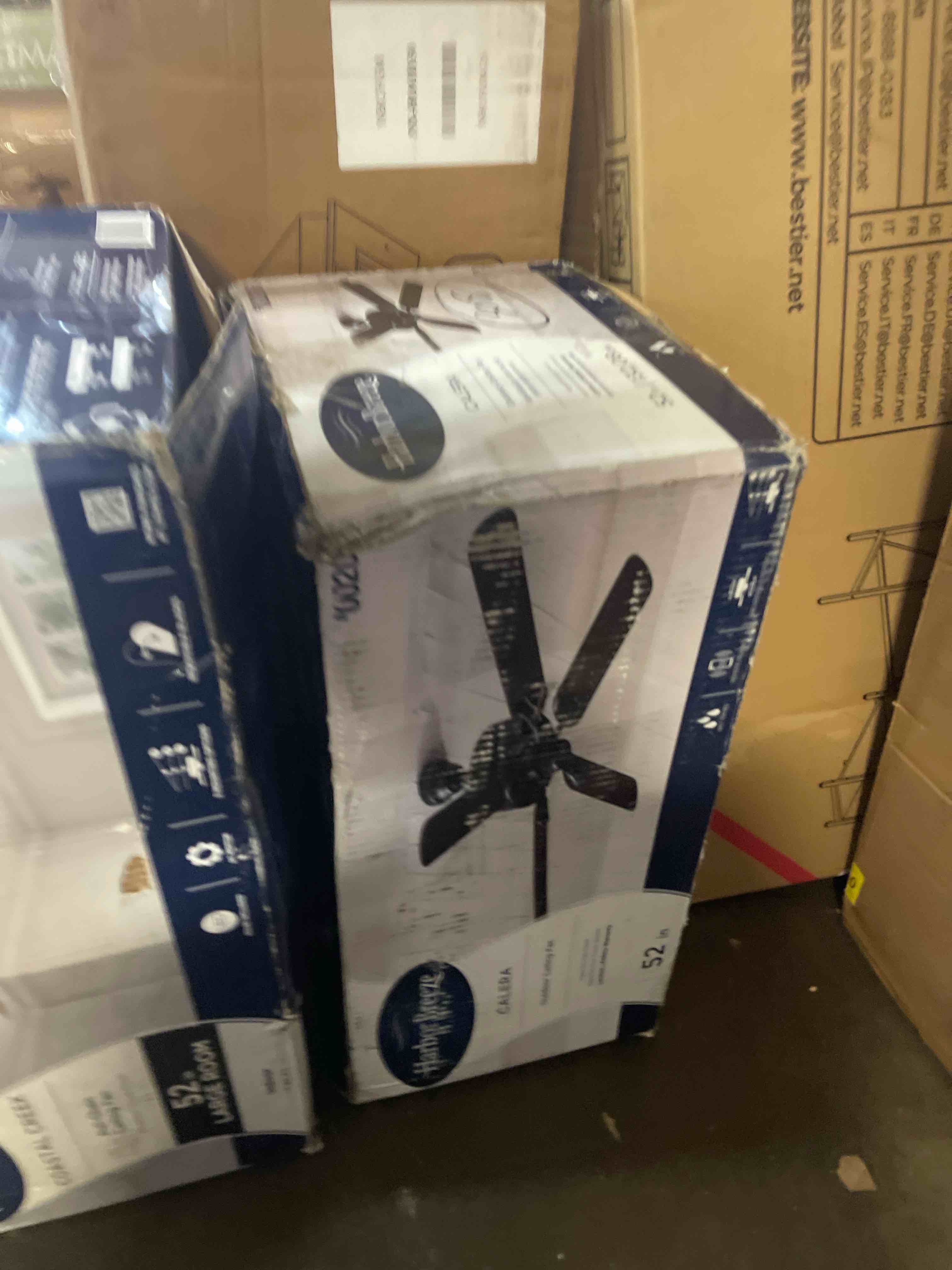 Condition photo showing New/Like New for harbor breeze calera 52-in bronze uncovered outdoor ceiling fan without light and pull chain included