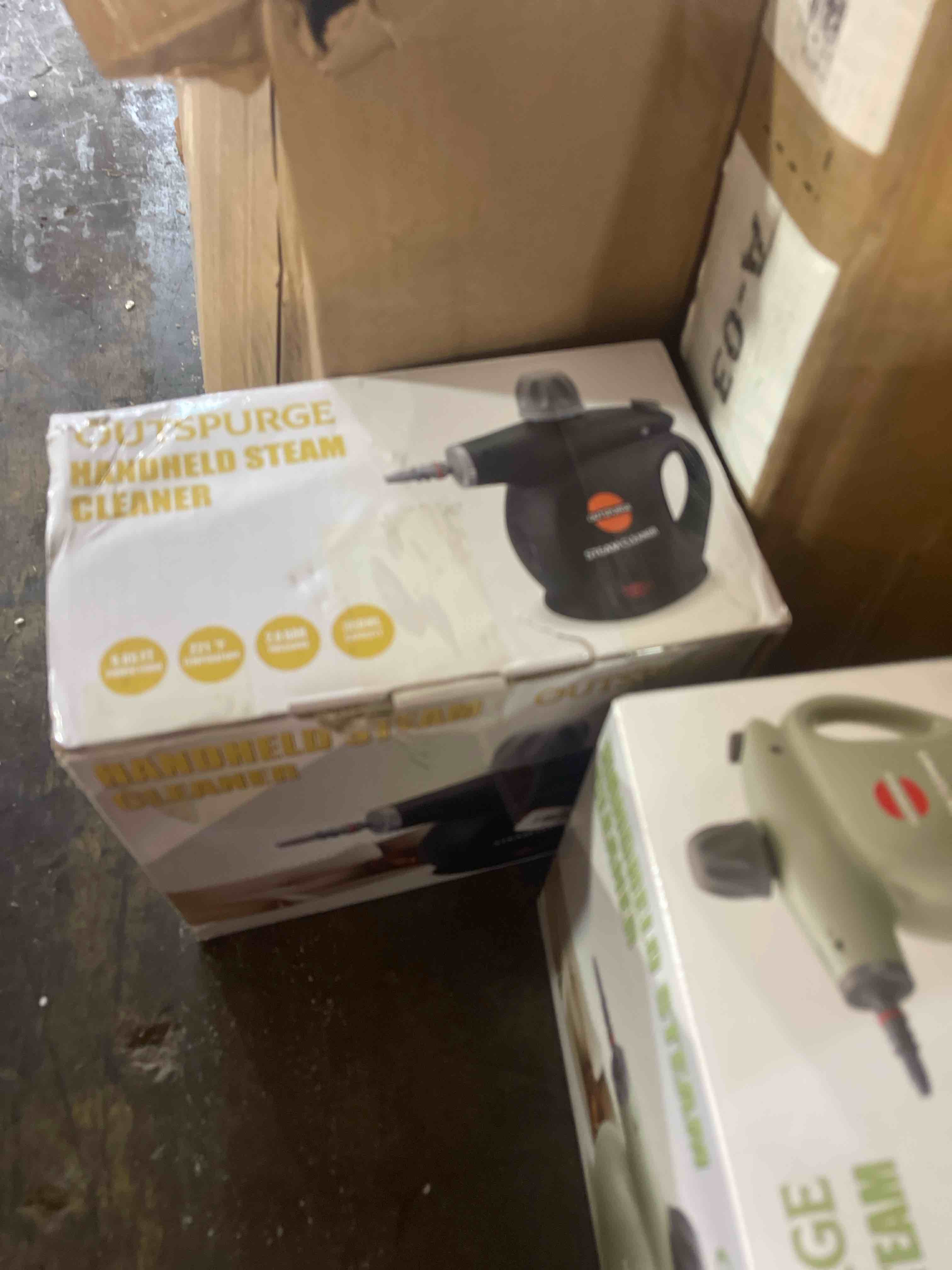 Condition photo showing New/Like New for handheld steam cleaner, pressurized multi-surface steam shot with 13 accessories, safety lock, steamer for cleaning floor, upholstery, grout, windows, couch and car (black)