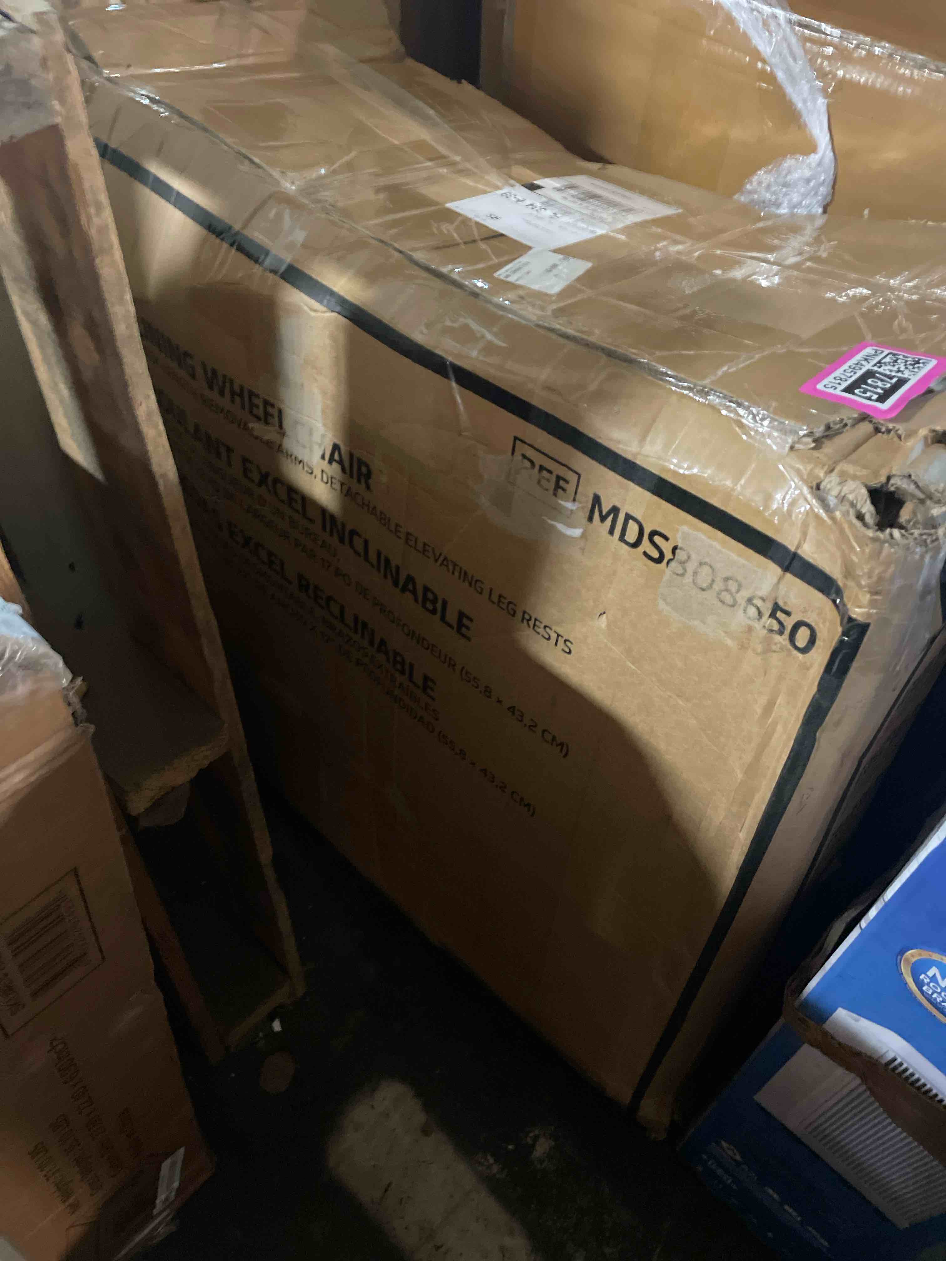 Condition photo showing Good Condition for medline lightweight foldable transport wheelchair with handbrakes and 12-inch wheels, blue frame, black upholstery