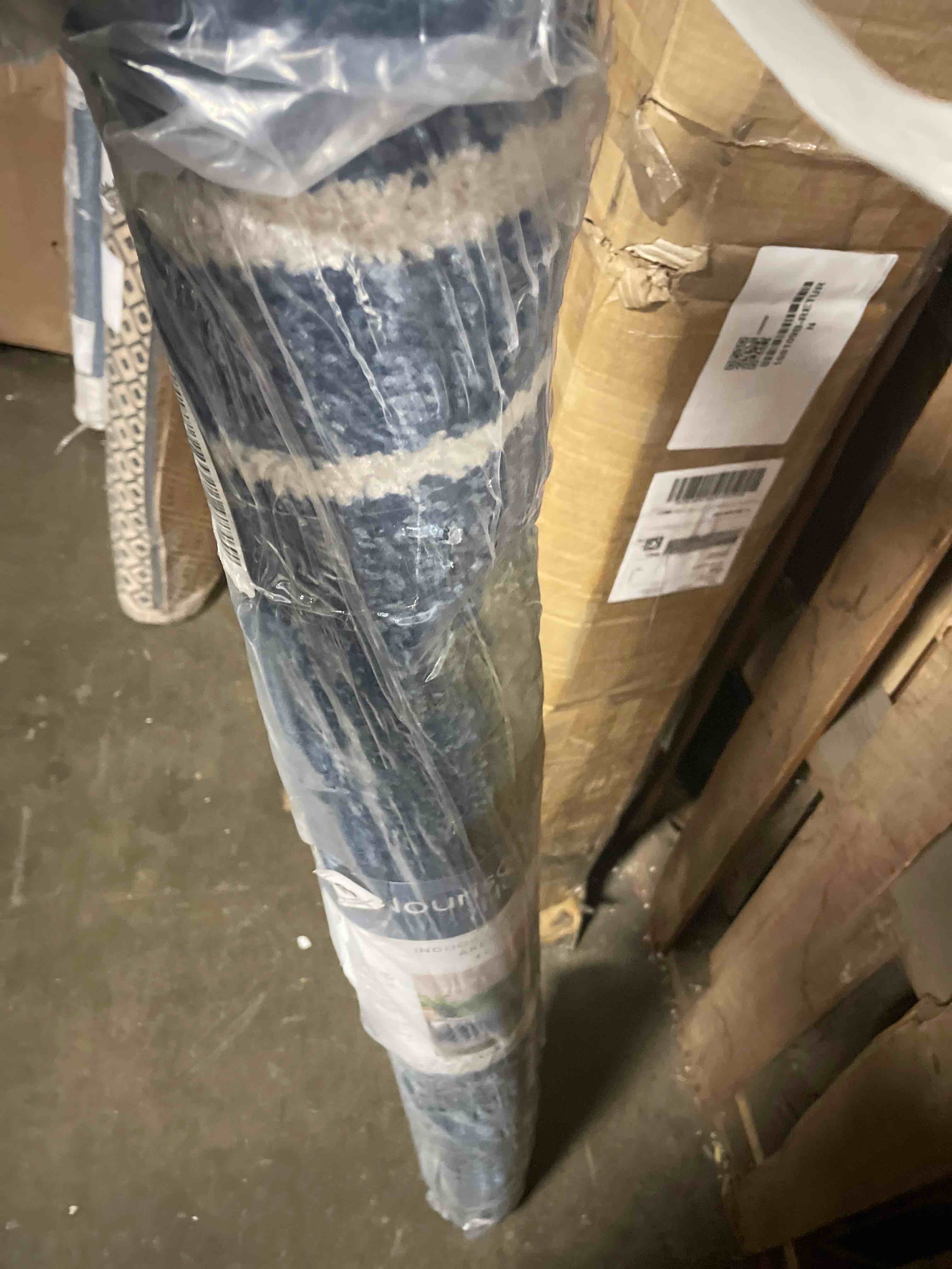 Condition photo showing New/Like New for nourison essentials contemporary bordered indoor/outdoor rug
