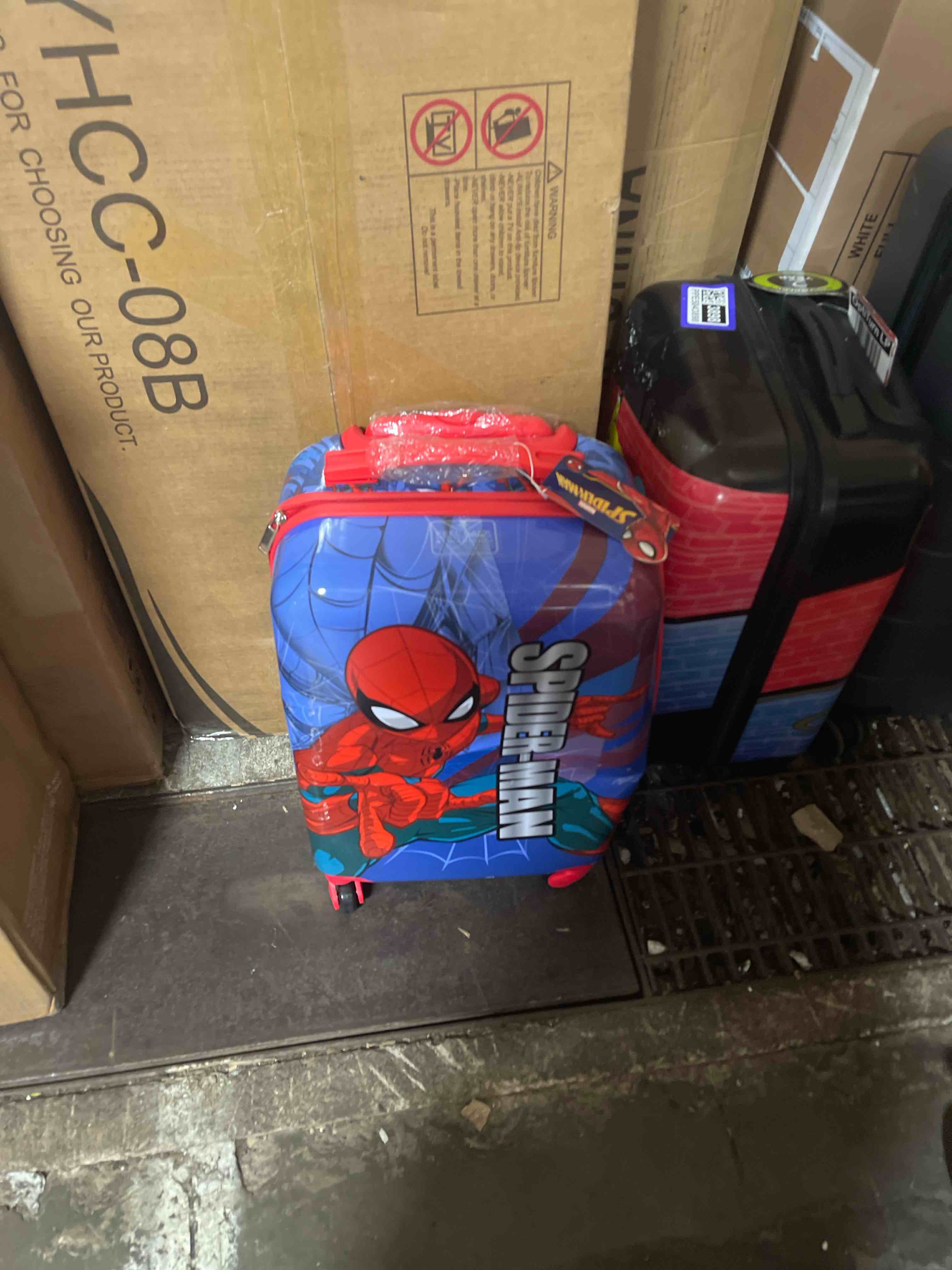 Condition photo showing New/Like New for marvel kids' spider-man hardside carry on spinner suitcase