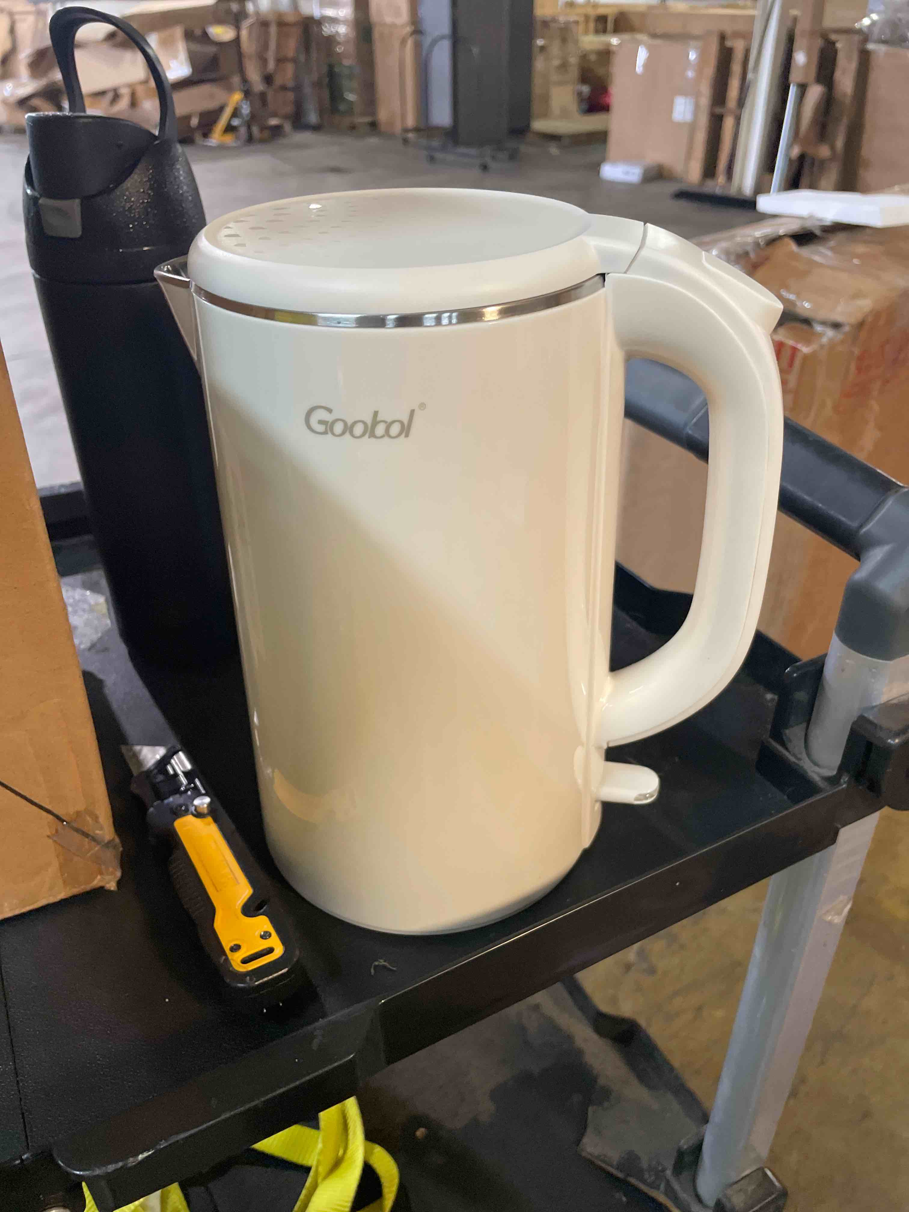 Condition photo showing New/Like New for no plastic contact electric kettle
