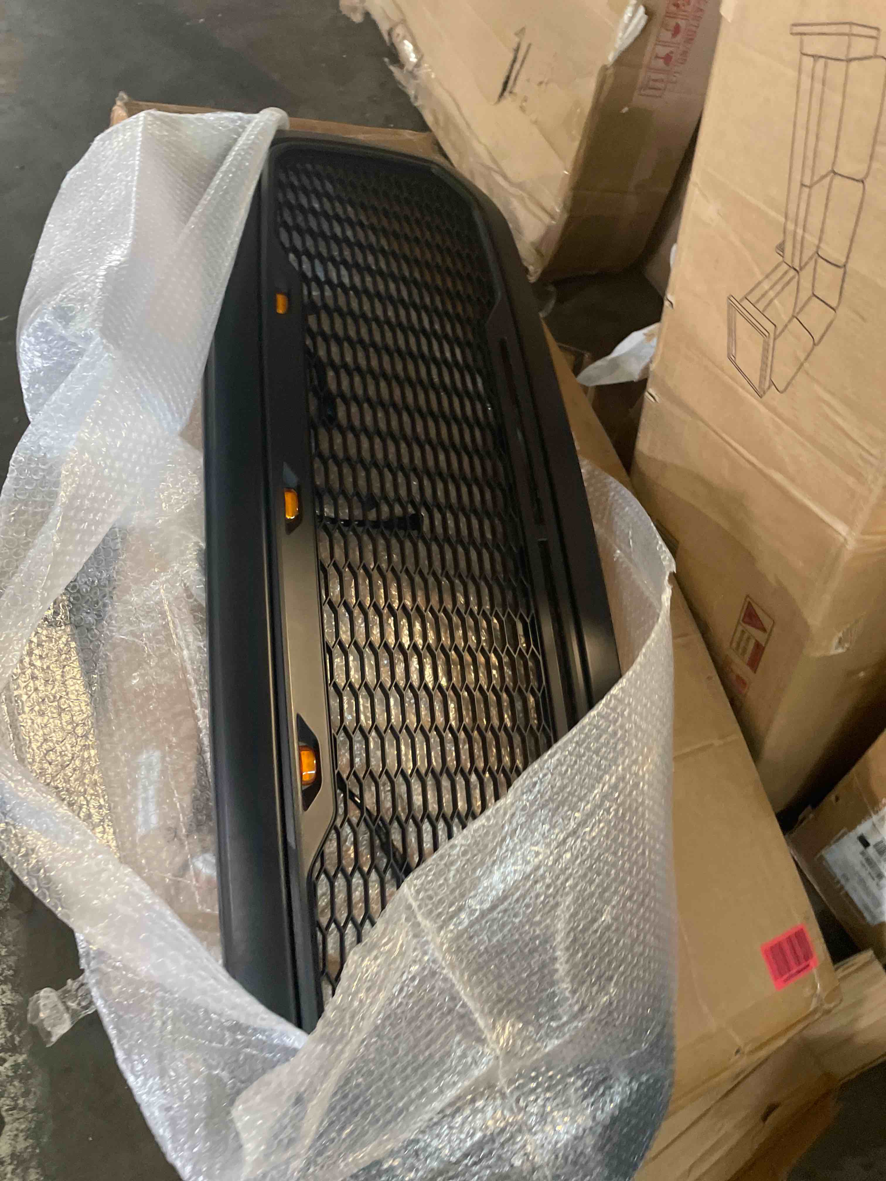 Condition photo showing New/Like New for front bumper grille for dodge ram 1500 2013-2018 matte black abs honeycomb bumper grill with amber led lights
