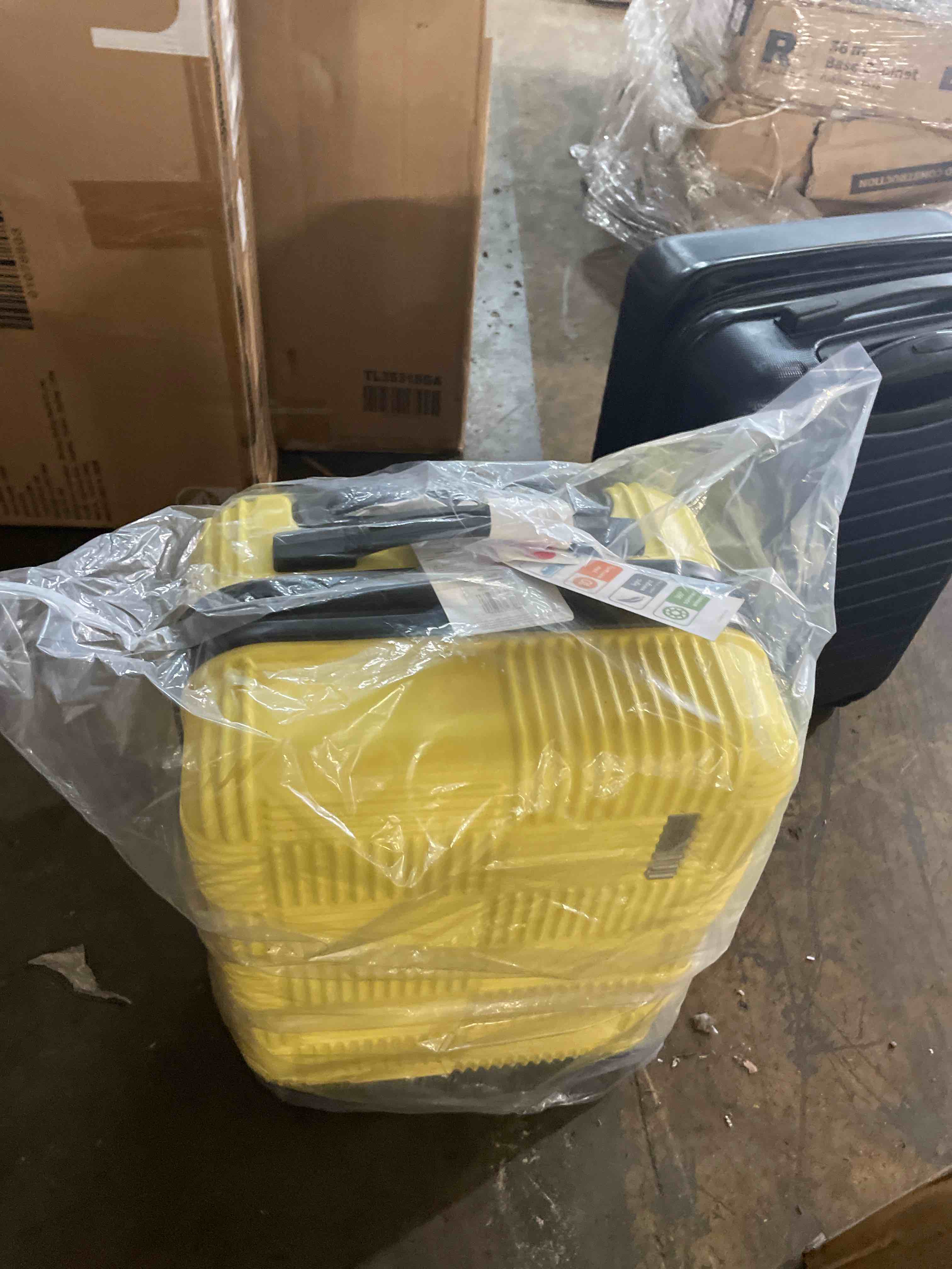 Condition photo showing New/Like New for american tourister nxt checkered hardside carry on spinner suitcase - yellow