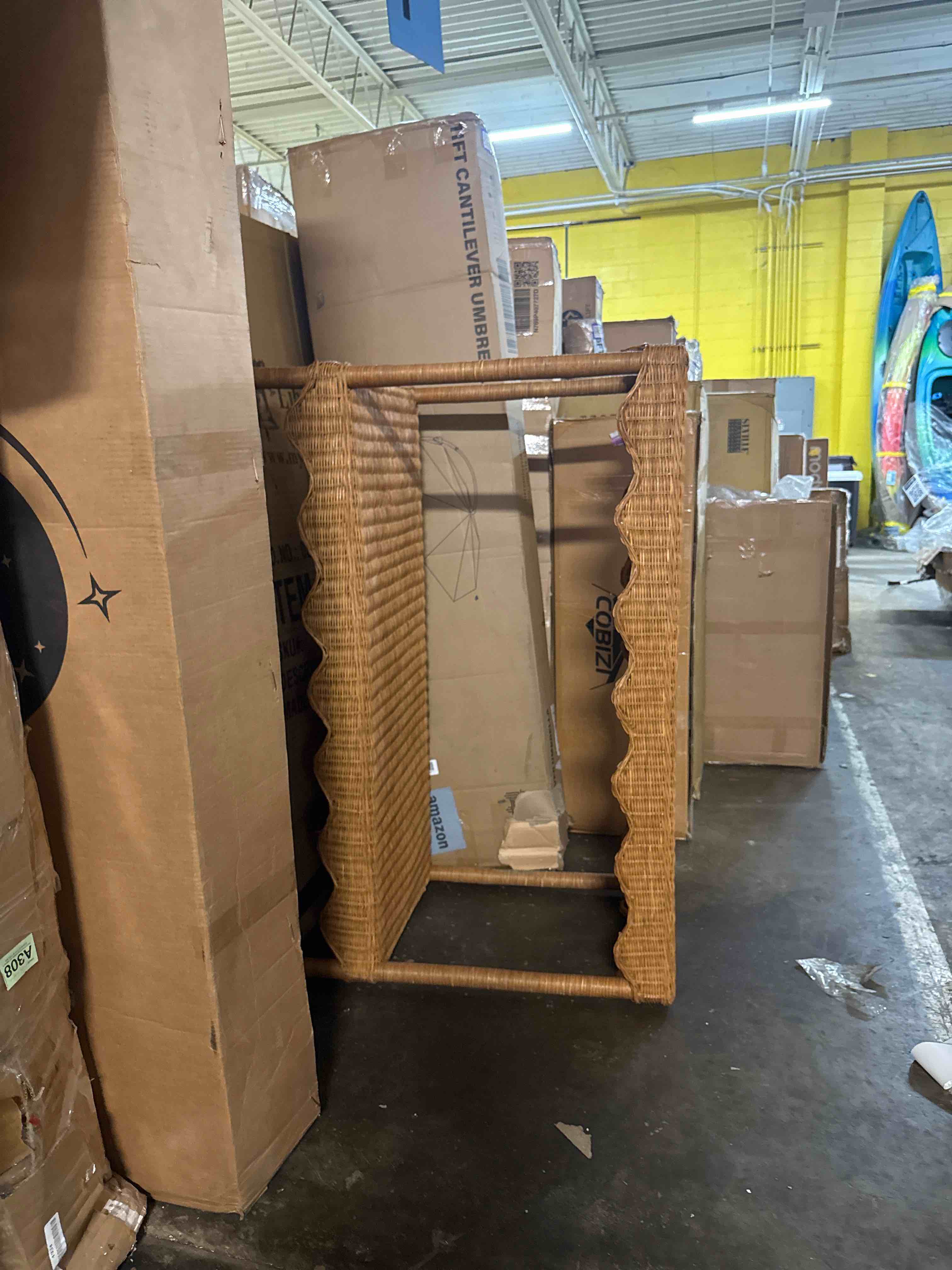 Condition photo showing New/Like New for bali & pari oteria bohemian light honey scalloped rattan console table
