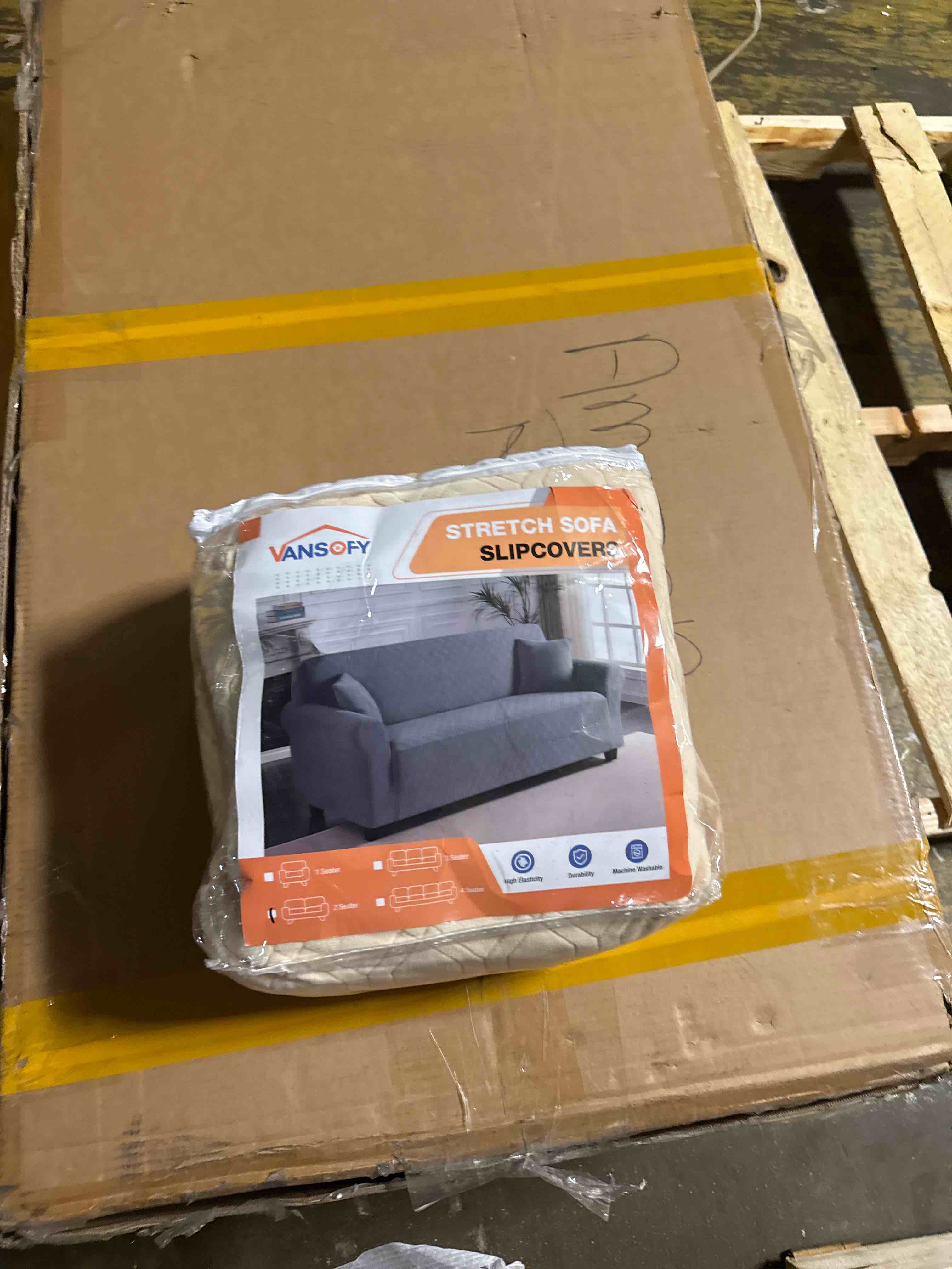 Condition photo showing New/Like New for mainstays herringbone stretch-to-fit sofa slipcover