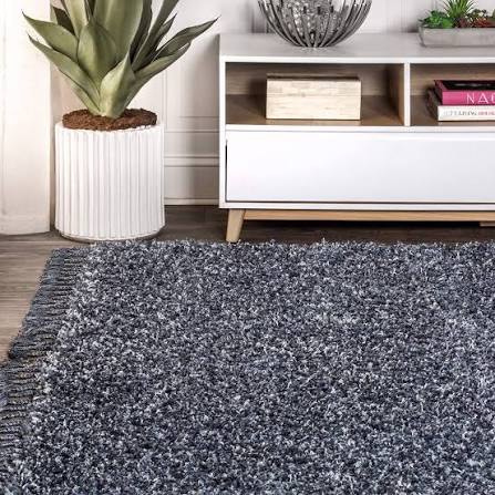 Condition photo showing New/Like New for jonathan y mcr100c-8 mercer shag plush tassel indoor area-rug bohemian modern contemporary solid easy-cleaning bedroom kitchen living room, 8 x 10, denim blue with tassel