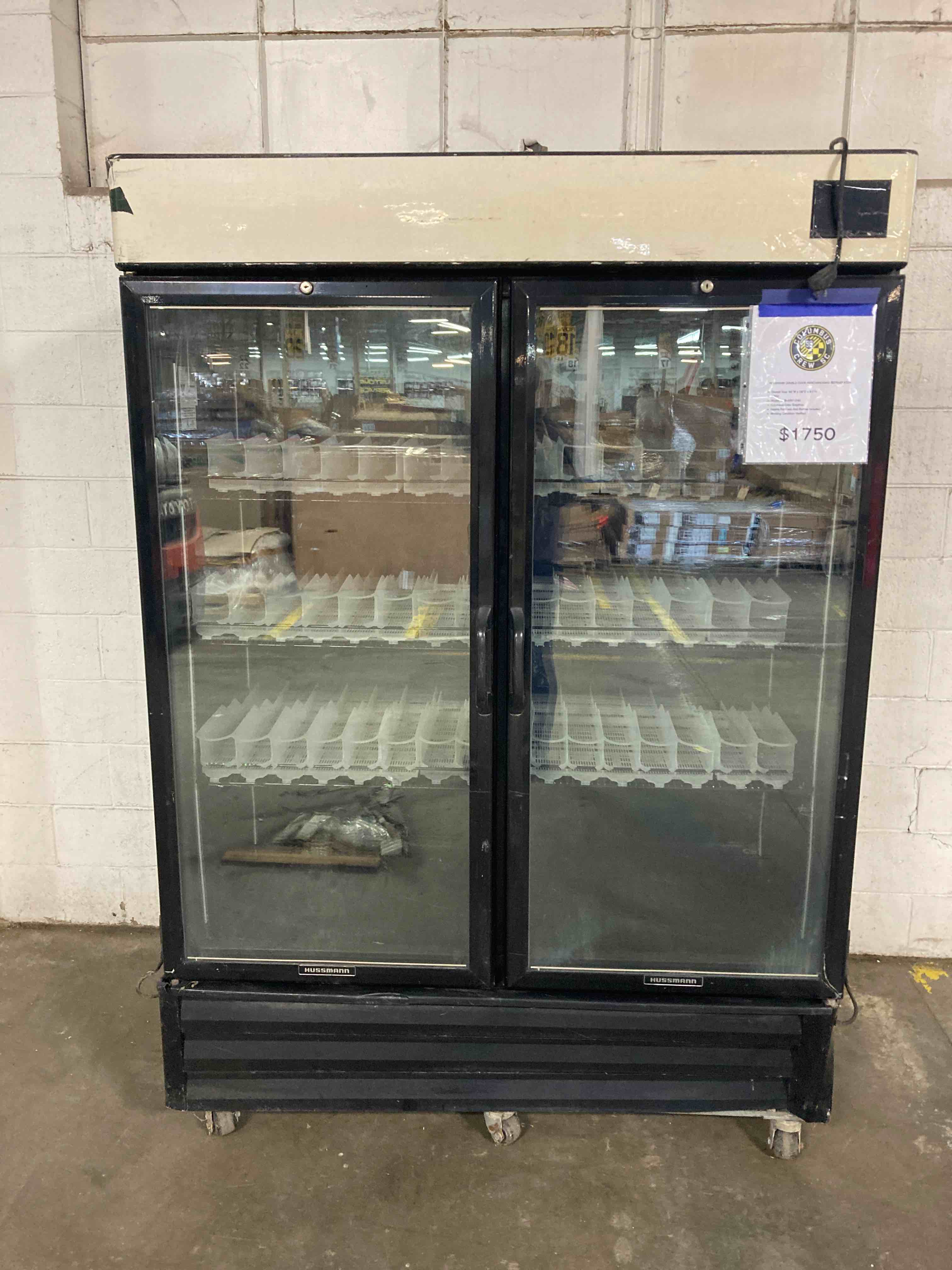 Hussmann Double Door Merchandising Refrigerator With Bottle/Can Racks