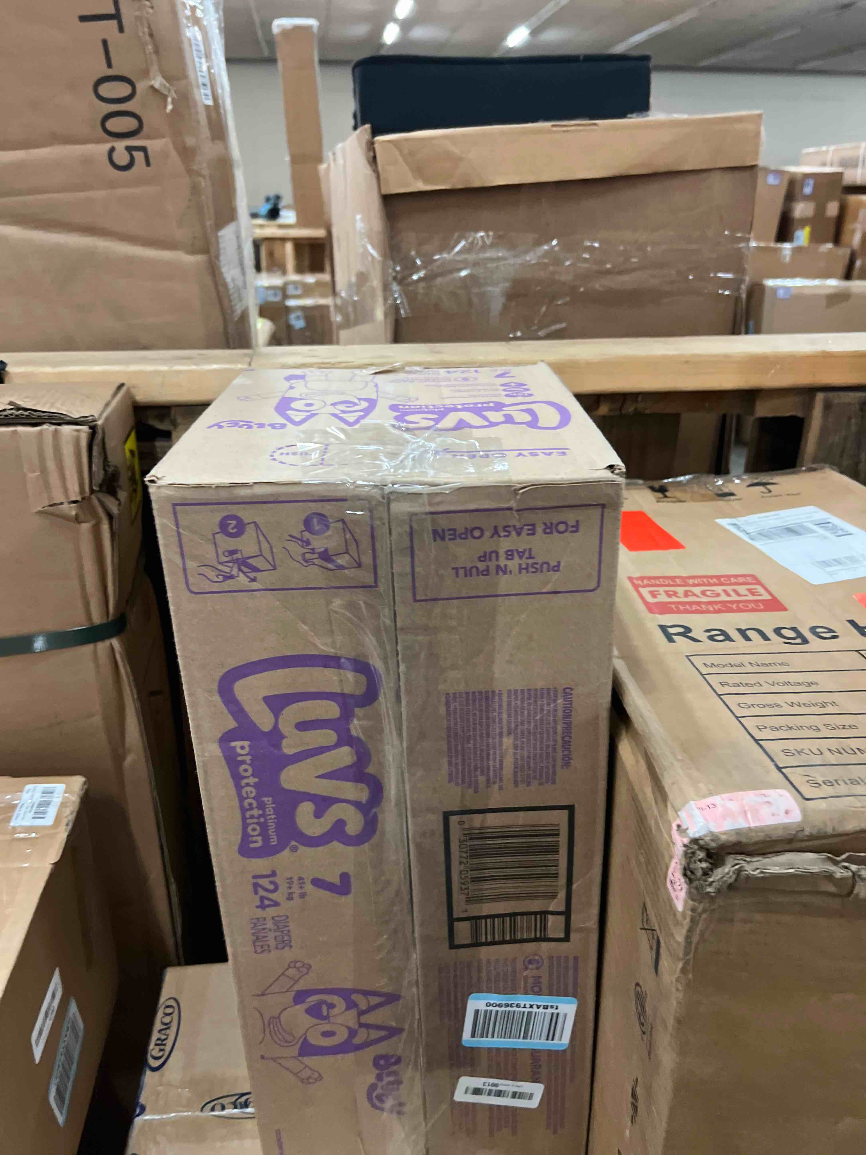 Condition photo showing New/Like New for Luvs Size 7 Baby Diapers, Platinum Protection Bluey Diapers for Day & Night, Size 7, 124 Count (Packaging May Vary) Size 7 124