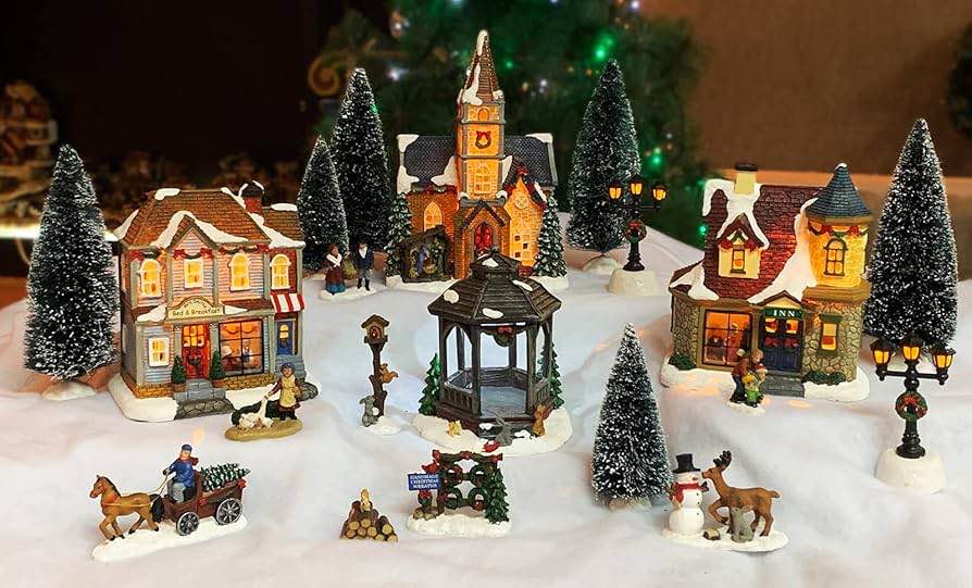 MOMENTS IN TIME 20-Piece Lighted Christmas Village Set with LED Lights Battery Operated Miniature Holiday Town Display Hand-Painted Christmas Houses, Figurines & Trees Gift-Ready Packaging