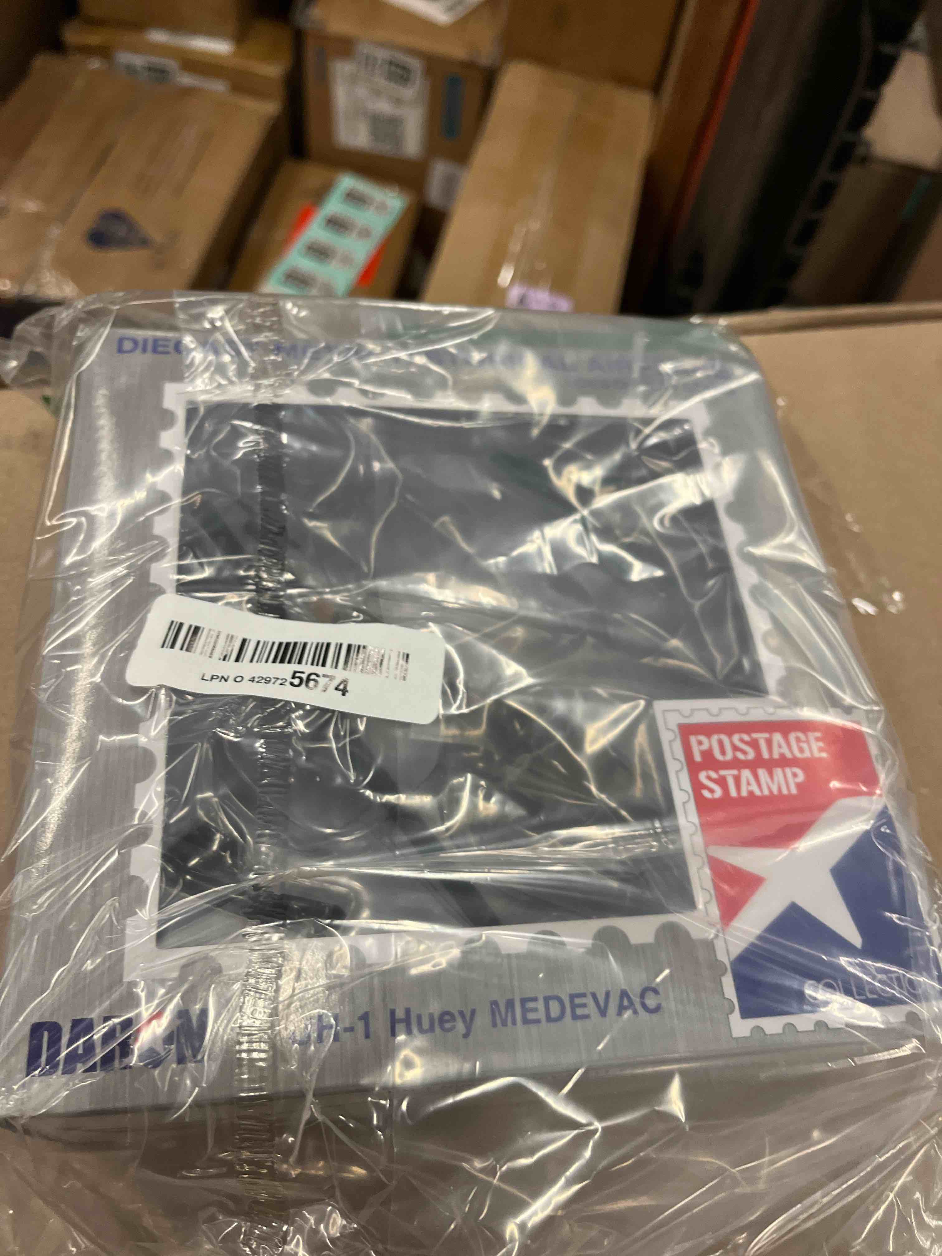 Condition photo showing New/Like New for Daron Worldwide Trading Postage Stamp UH-1 Huey MEDEVAC US Army Vehicle (1/87 Scale)