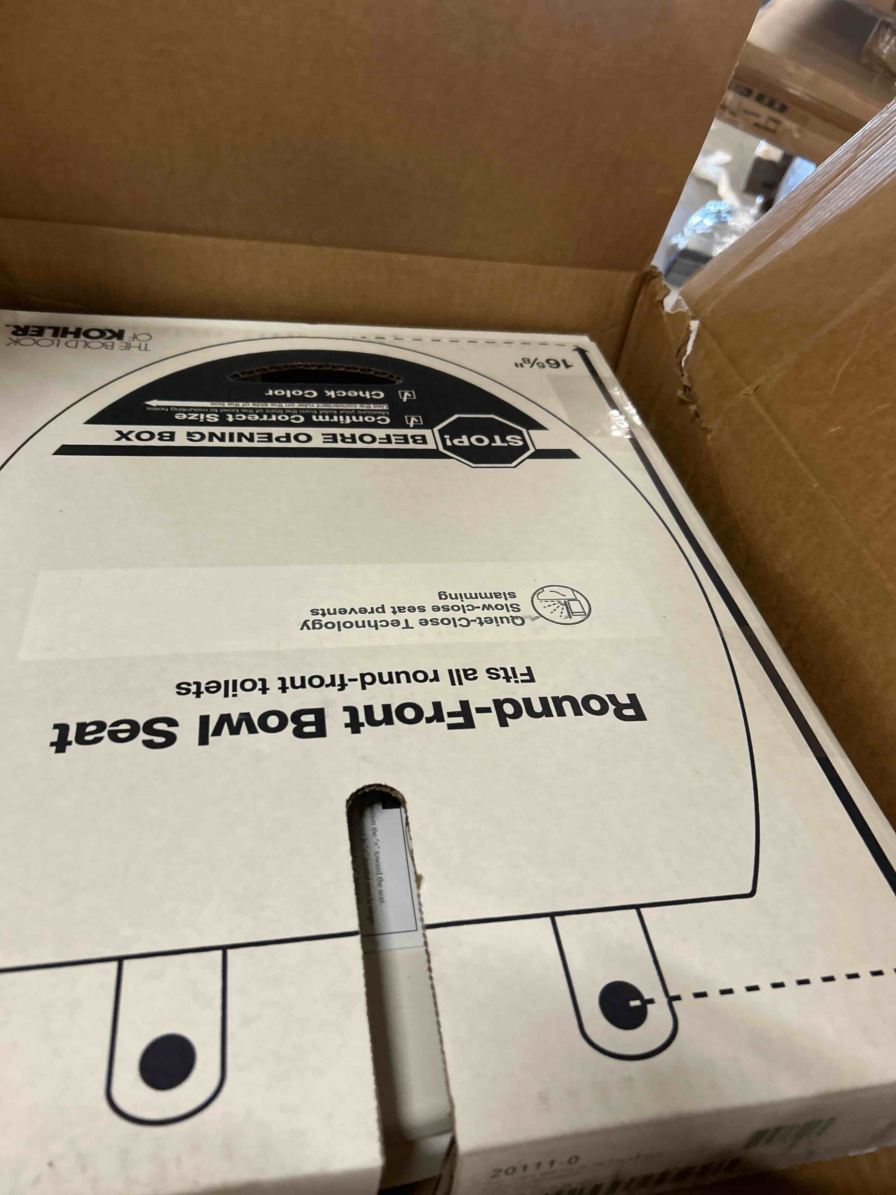 Condition photo showing New/Like New for kohler brevia slow close round white plastic toilet seat