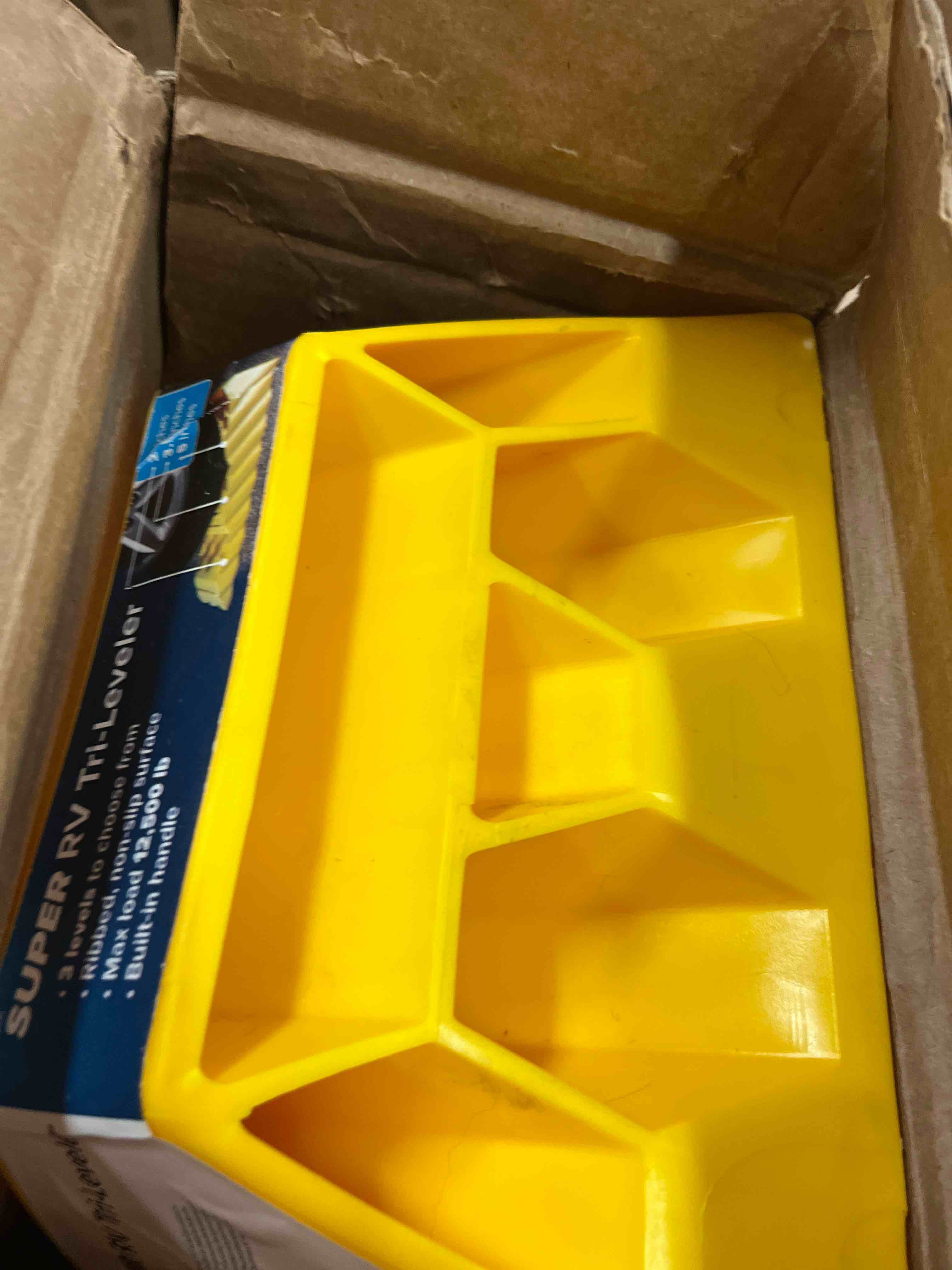 Condition photo showing New/Like New for camco rv super tri-leveler | features 3 leveling heights for campers, a 12,500lb load capacity, a built-in carry handle, and is ideal for campers, rvs, travel trailers, and more (21028)