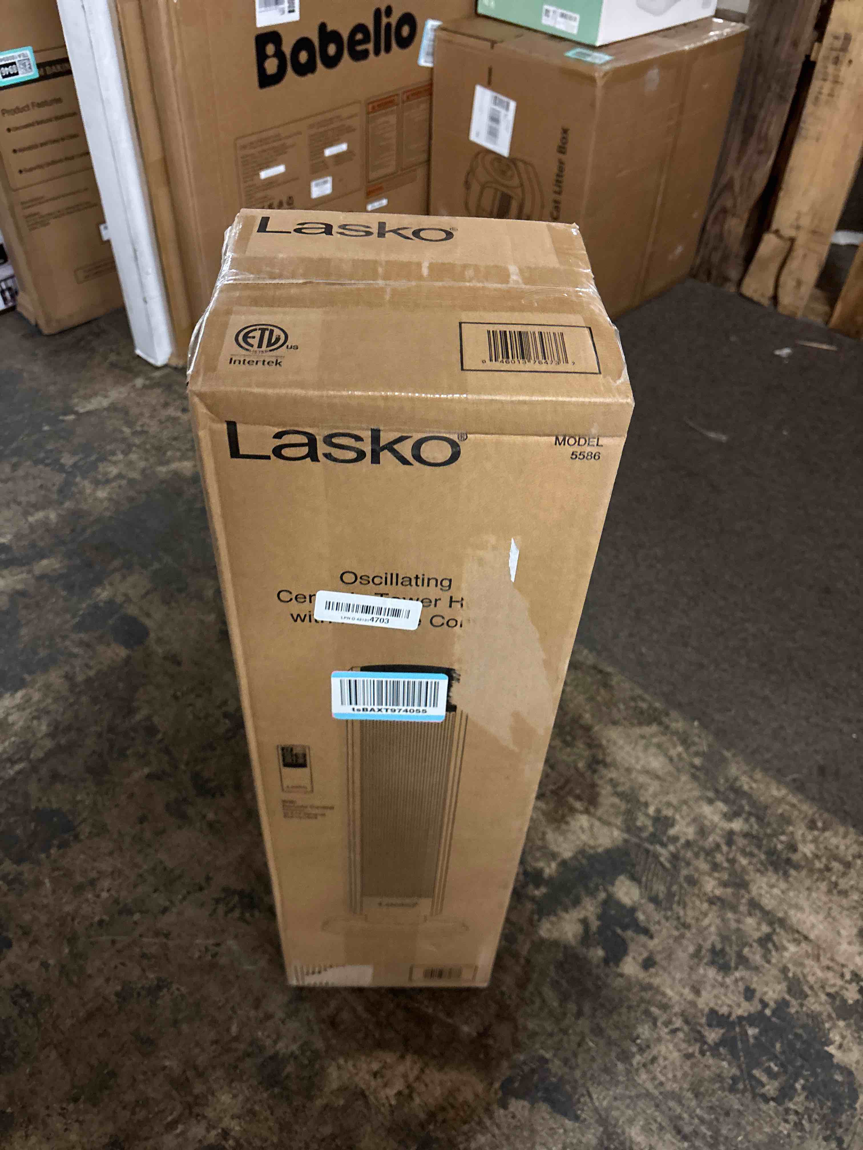 Condition photo showing New/Like New for Lasko - Oscillating Ceramic Tower Heater with Logic Center Remote Control - Gray/Black