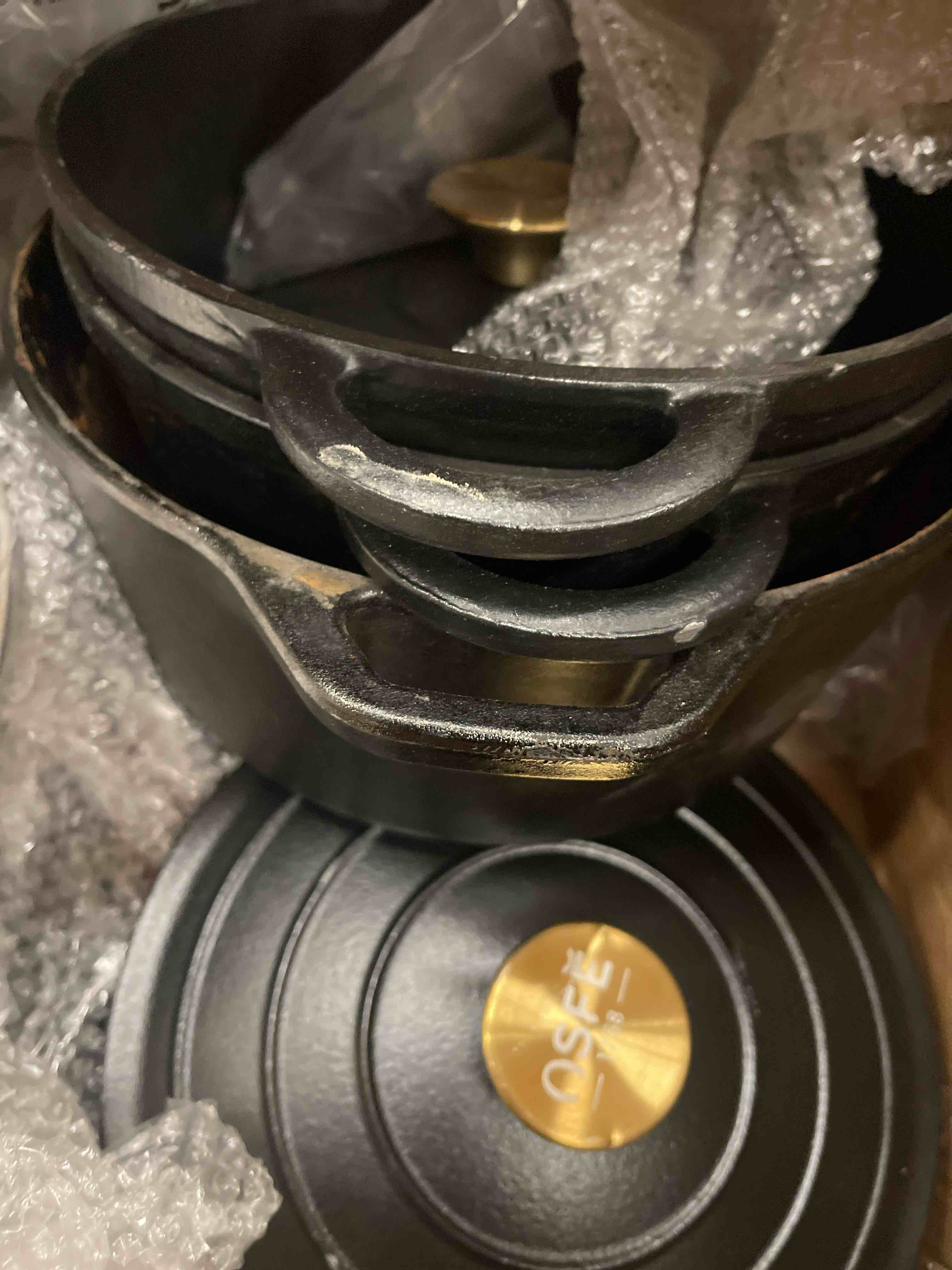 Condition photo showing As Is for OSFE CAST IRON COOKWARE SET- BLACK (SIMILAR TO STOCK PHOTO)