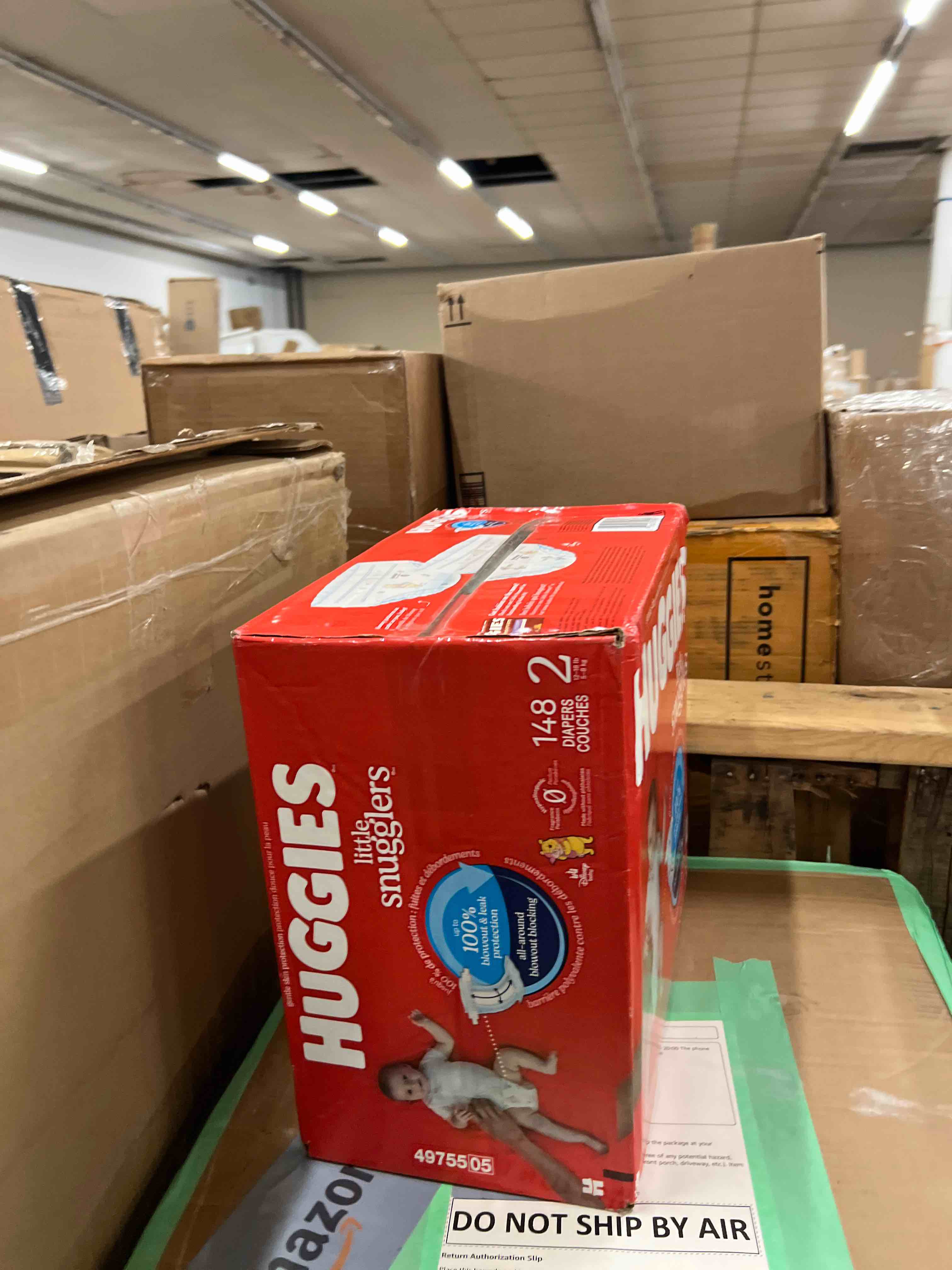 Condition photo showing New/Like New for huggies size 2 diapers, little snugglers baby diapers, size 2 (12-18 lbs), 148 count, packaging may vary